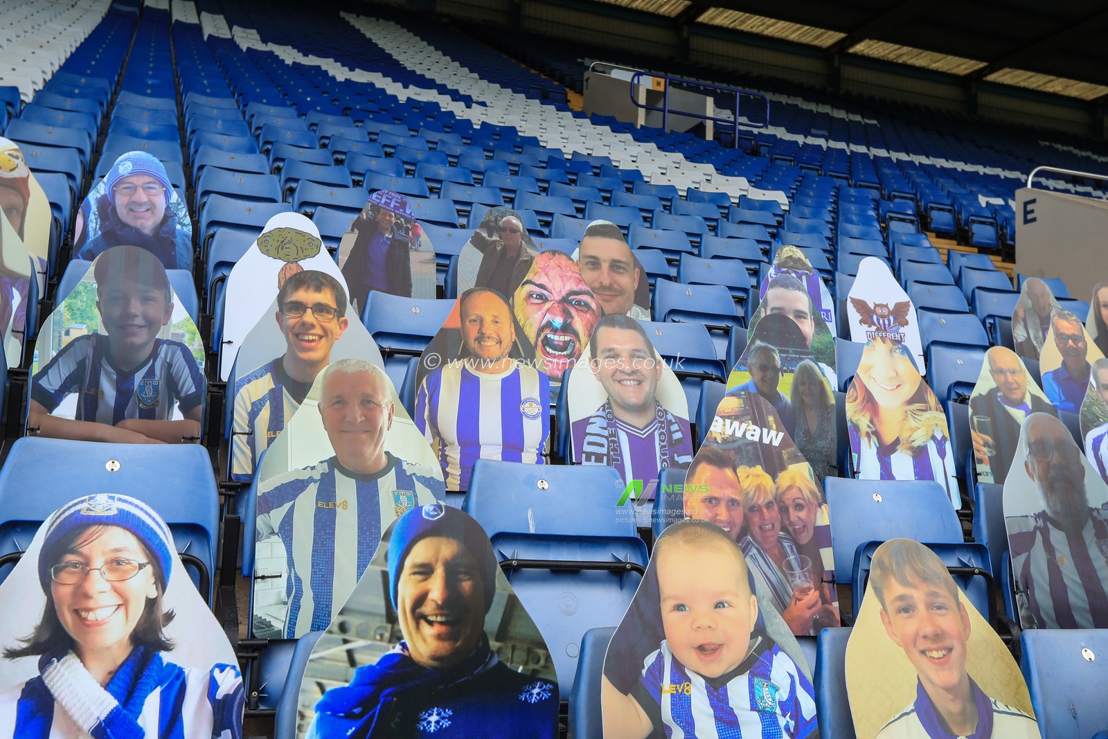Sheffield Wednesday fans display cardboard cutouts of them selfs as they canâ€™t attend todays game due to it being held behind closed doors