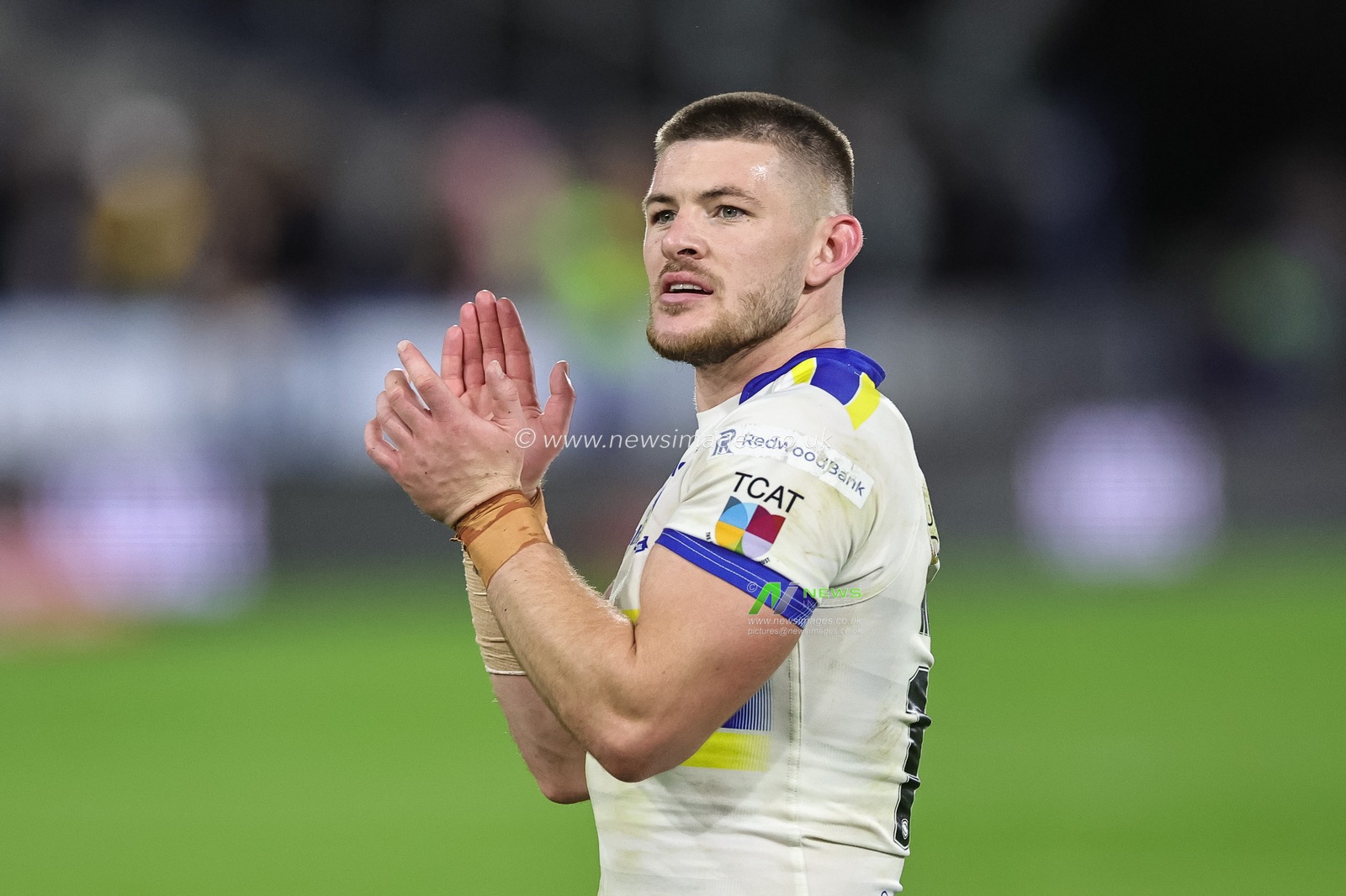 Danny Walker #16 of Warrington Wolves applauds the traveling fans during the Betfred Super League Round 27 match Huddersfield Giants vs Warrington Wolves at John Smith's Stadium, Huddersfield, United Kingdom, 22nd September 2023

(Photo by Mark Cosgrove/News Images)