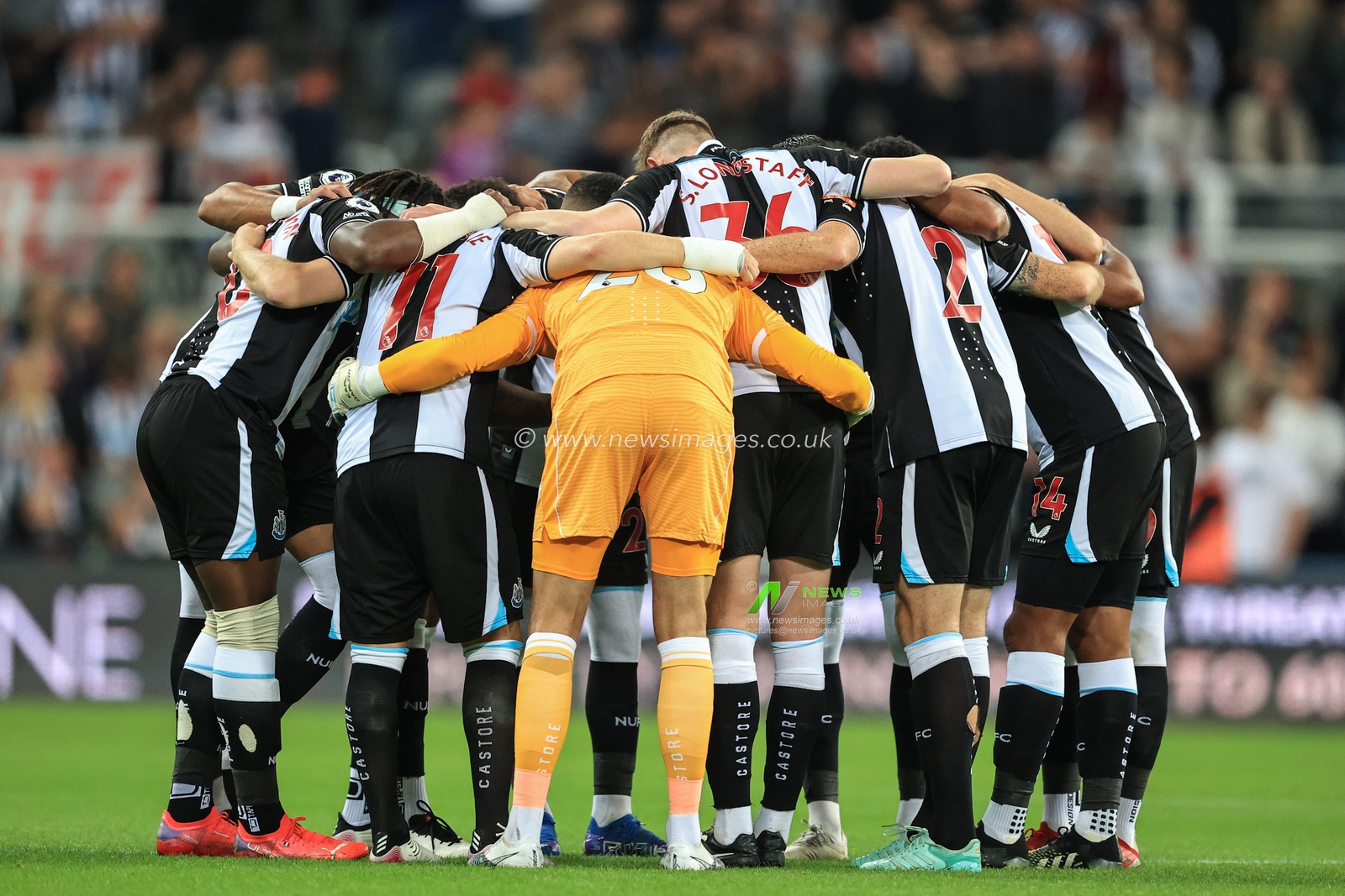 Newcastle players in group huddle