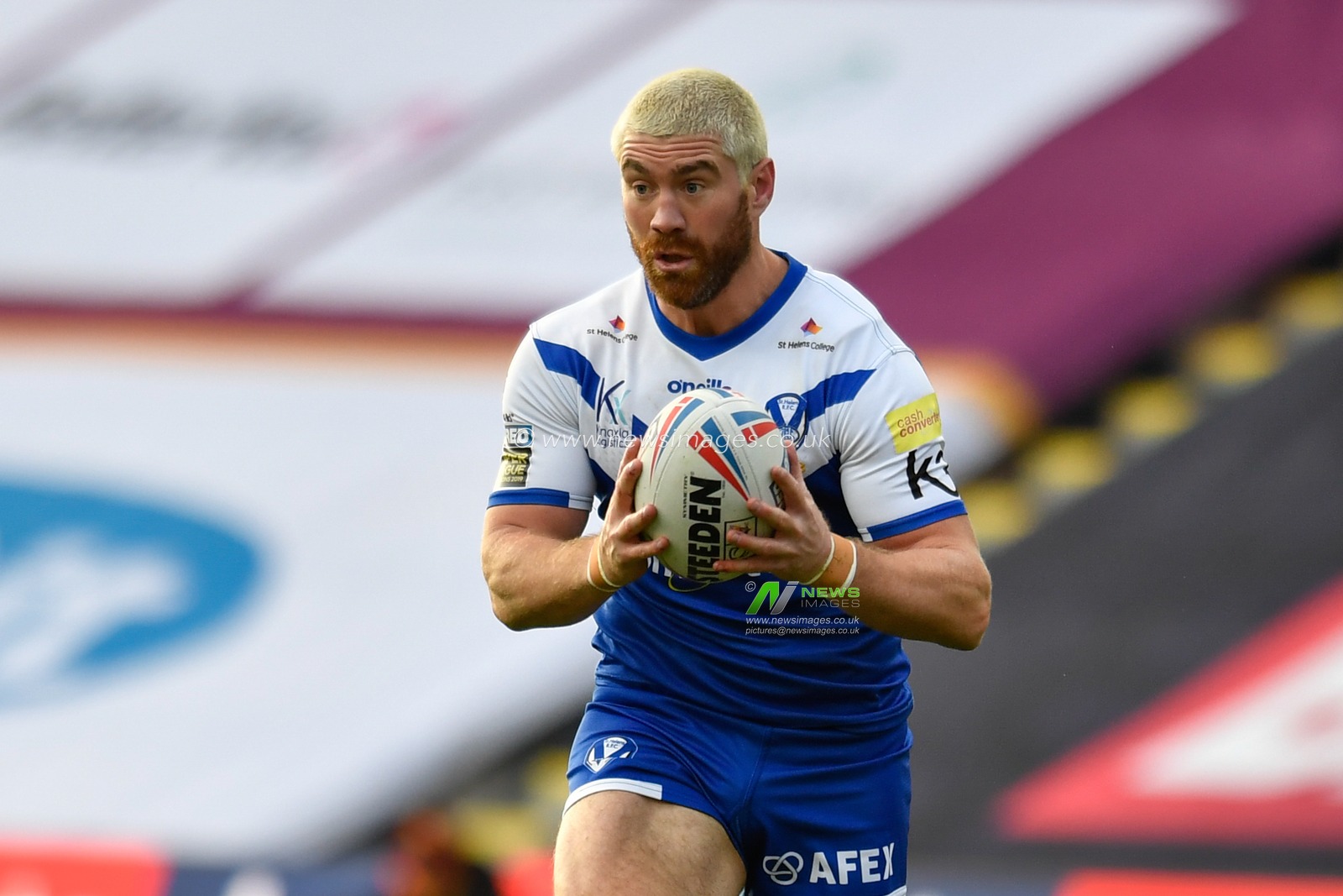 Kyle Amor (16) of St Helens in action during the game