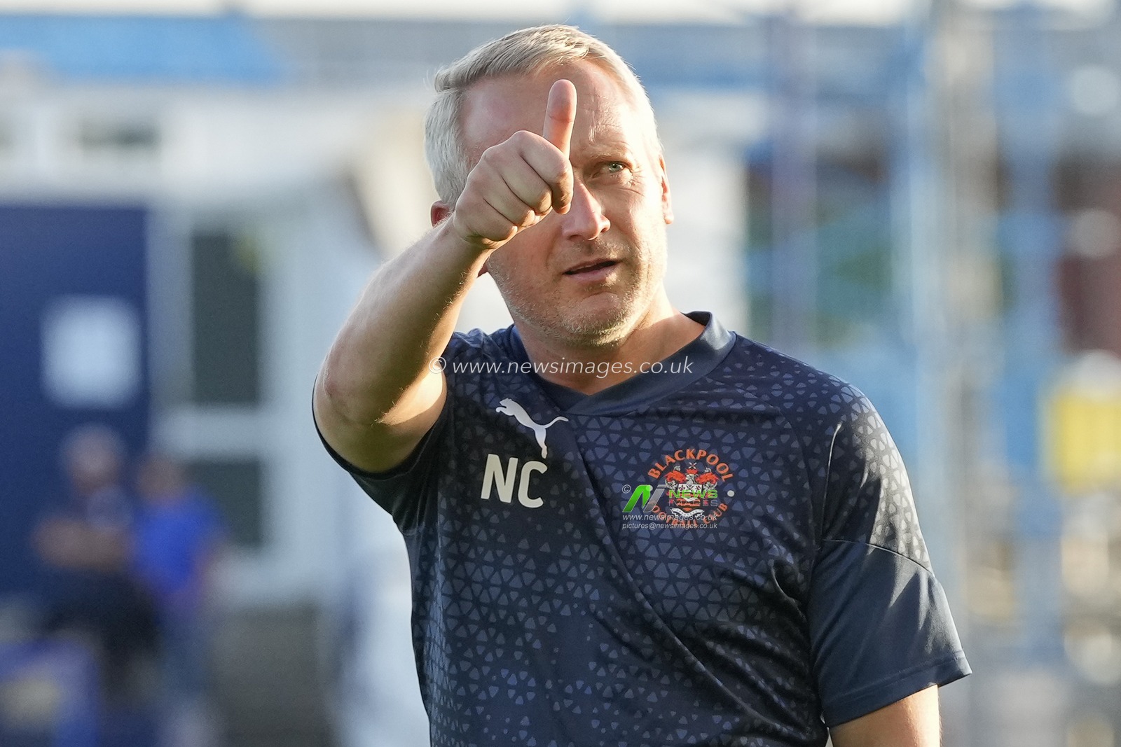 Neil Critchley, Manager of Blackpool salutes the fans before  the EFL Trophy match Barrow vs Blackpool at SO Legal Stadium, Barrow-in-Furness, United Kingdom, 5th September 2023

(Photo by Steve Flynn/News Images)