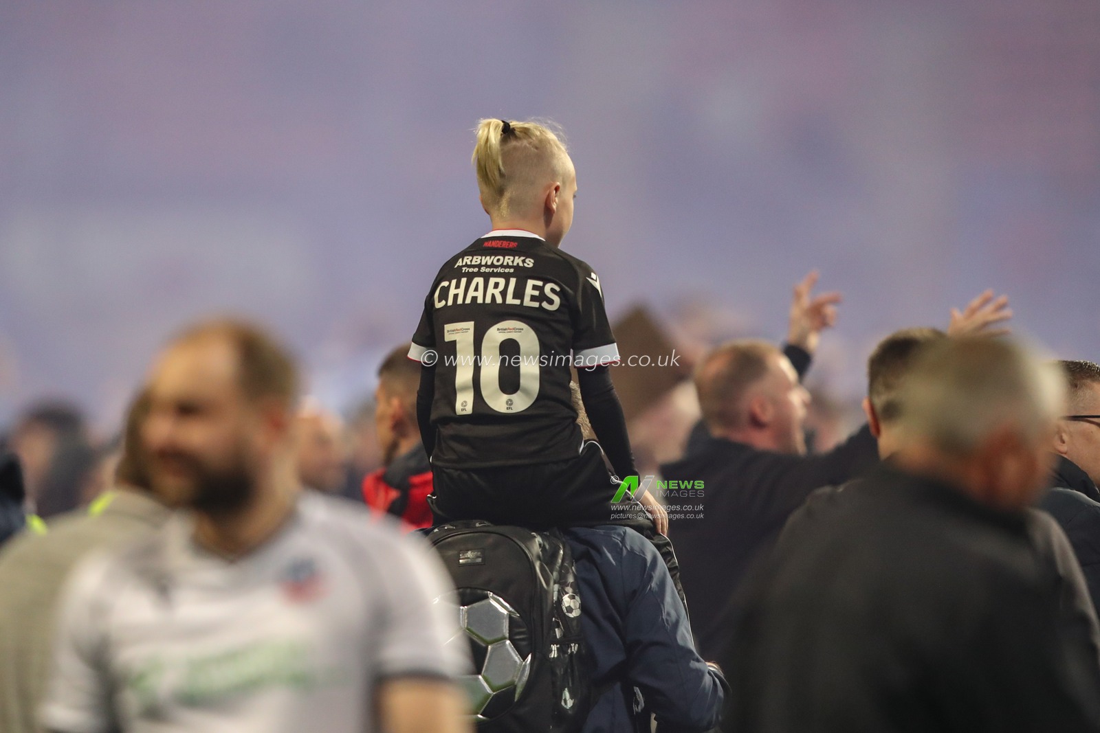 Bolton fans celebrate winning the League 1 Play-offs Semi-final  during the Sky Bet League 1 Play-offs Semi-final second leg match Bolton Wanderers vs Barnsley at Toughsheet Community Stadium, Bolton, United Kingdom, 7th May 2024

(Photo by Alfie Cosgrove/News Images)