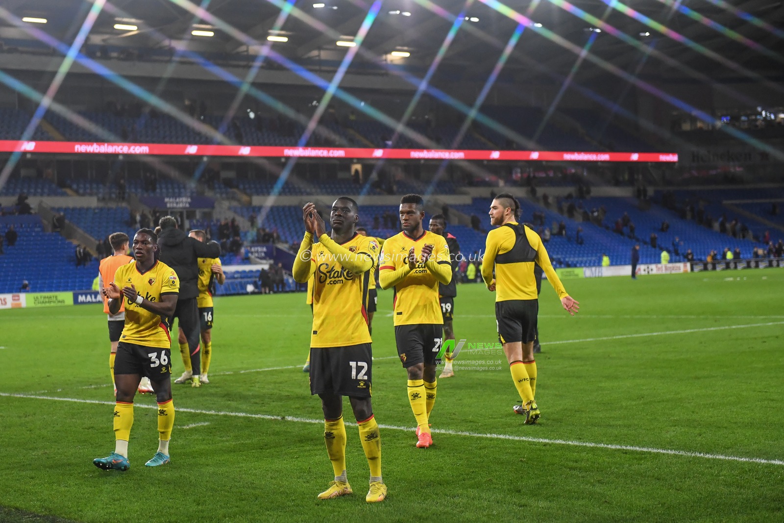 Ken Sema #12 of Watford and Joseph Hungbo #36 of Watford Applauds the travelling supporters at the final whistle in the Sky Bet Championship match Cardiff City vs Watford at Cardiff City Stadium, Cardiff, United Kingdom, 2nd November 2022

(Photo by Mike Jones/News Images)