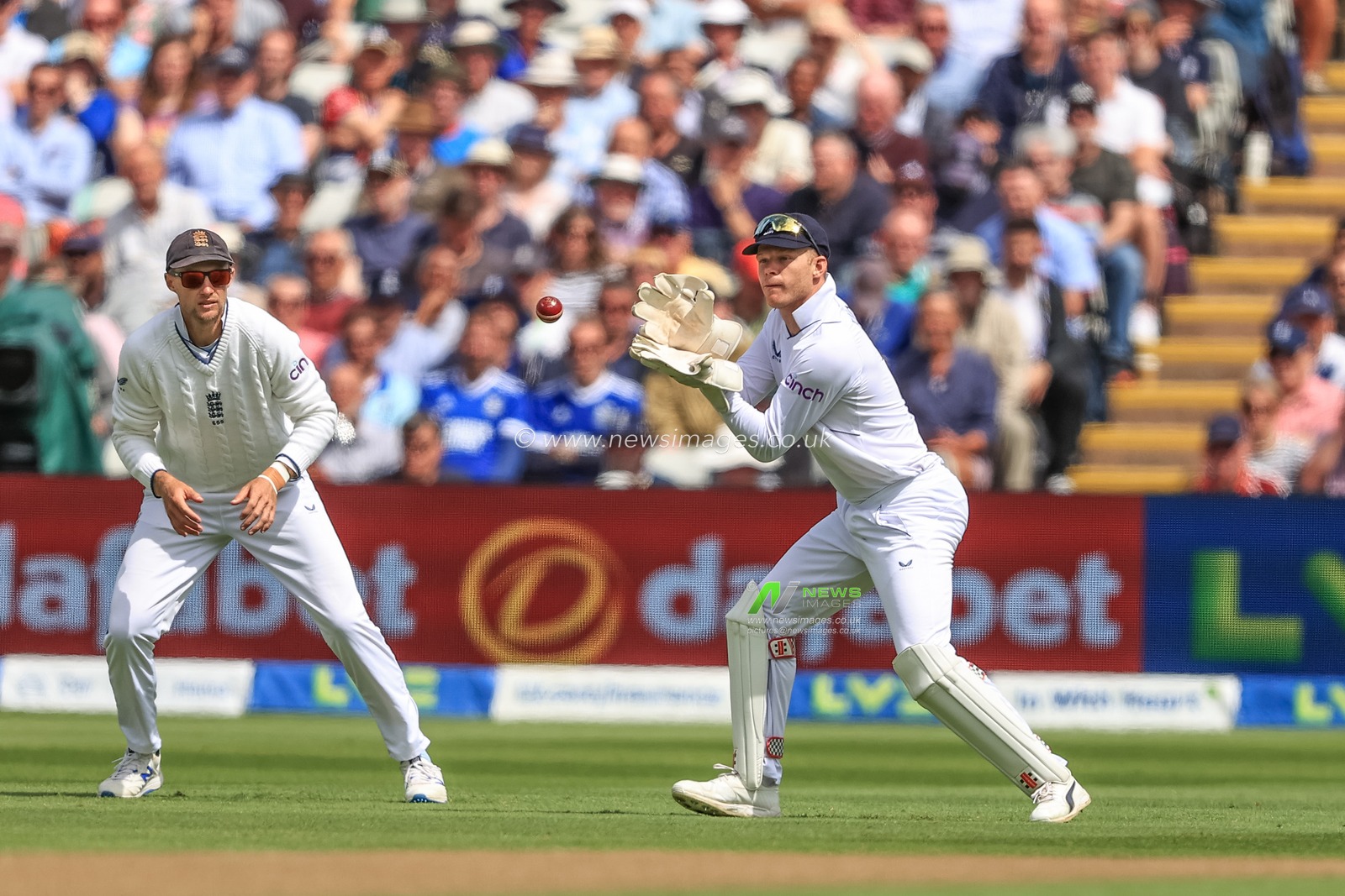 Sam Billings of England makes a catch