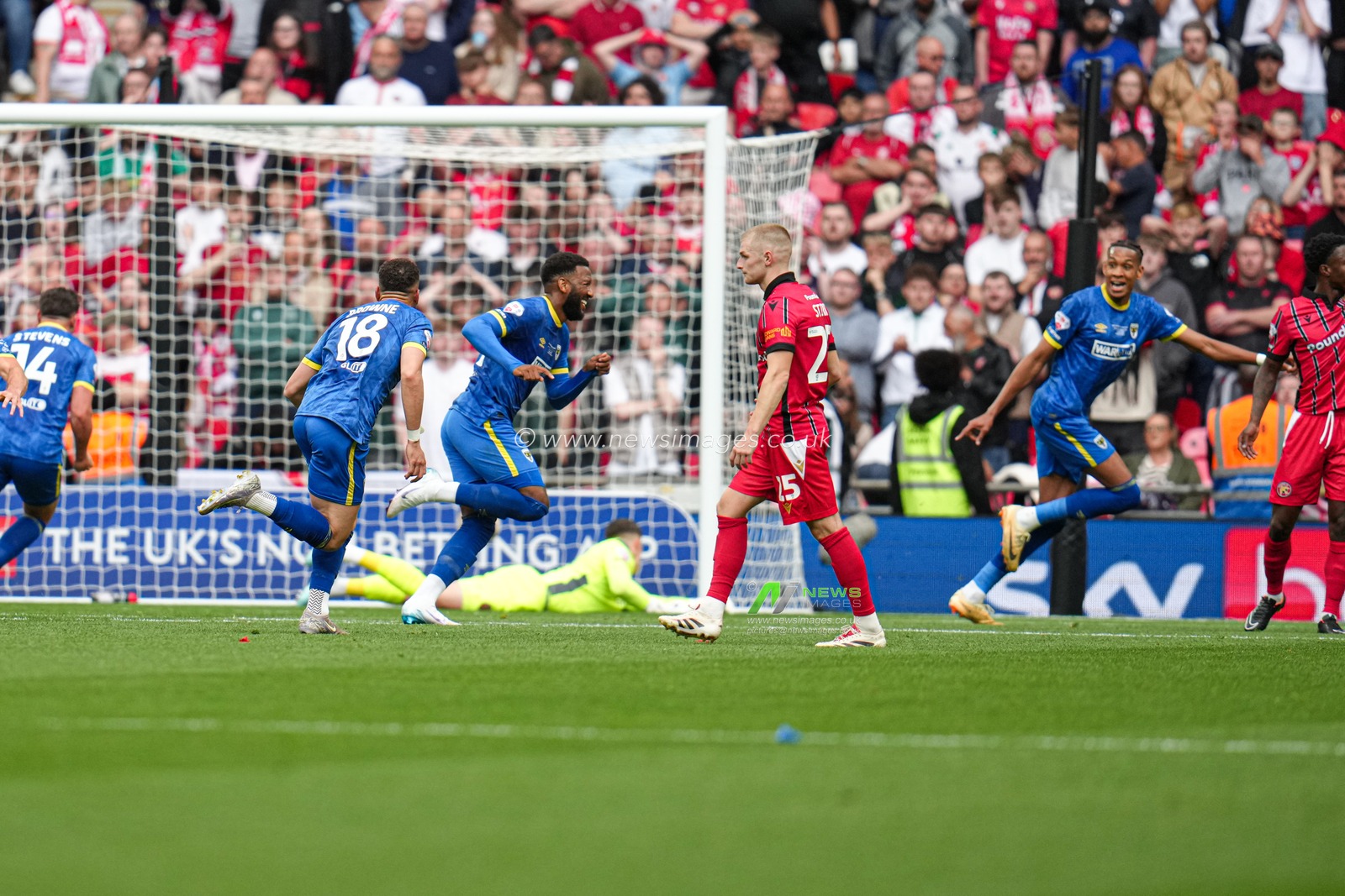 Myles Hippolyte of AFC Wimbledon celebrates goal to open the scoring during the Sky Bet League 2 Playoff Final match AFC Wimbledon vs Walsall at Wembley Stadium, London, United Kingdom, 26th May 2025

(Photo by Harvey Murphy/News Images)