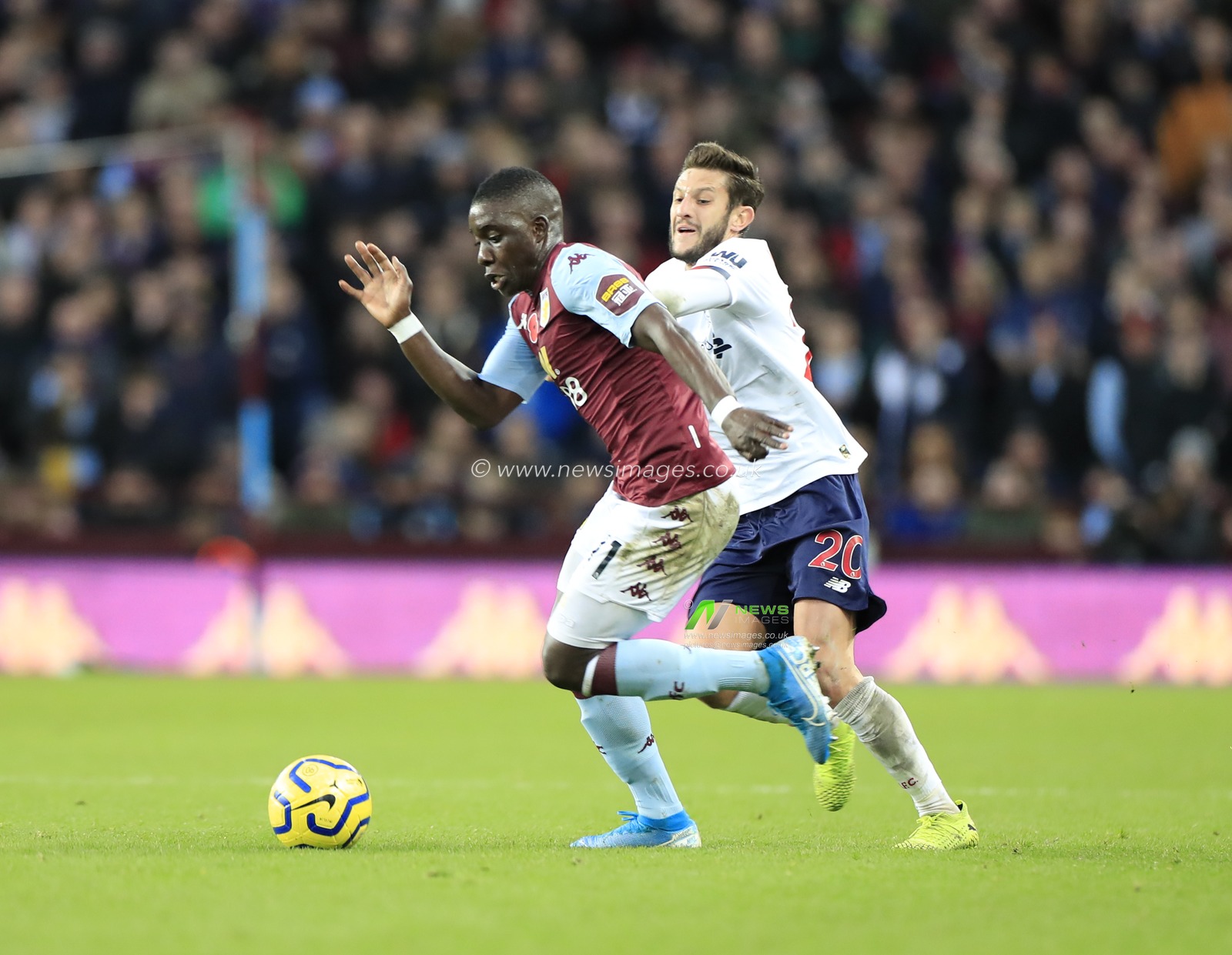 2nd November 2019, Villa Park, Birmingham, England; Premier League, Aston Villa v Liverpool : Marvelous Nakamba (11) of Aston Villa is challenged by Adam Lallana (20) of Liverpool

Credit: Conor Molloy/News Images
