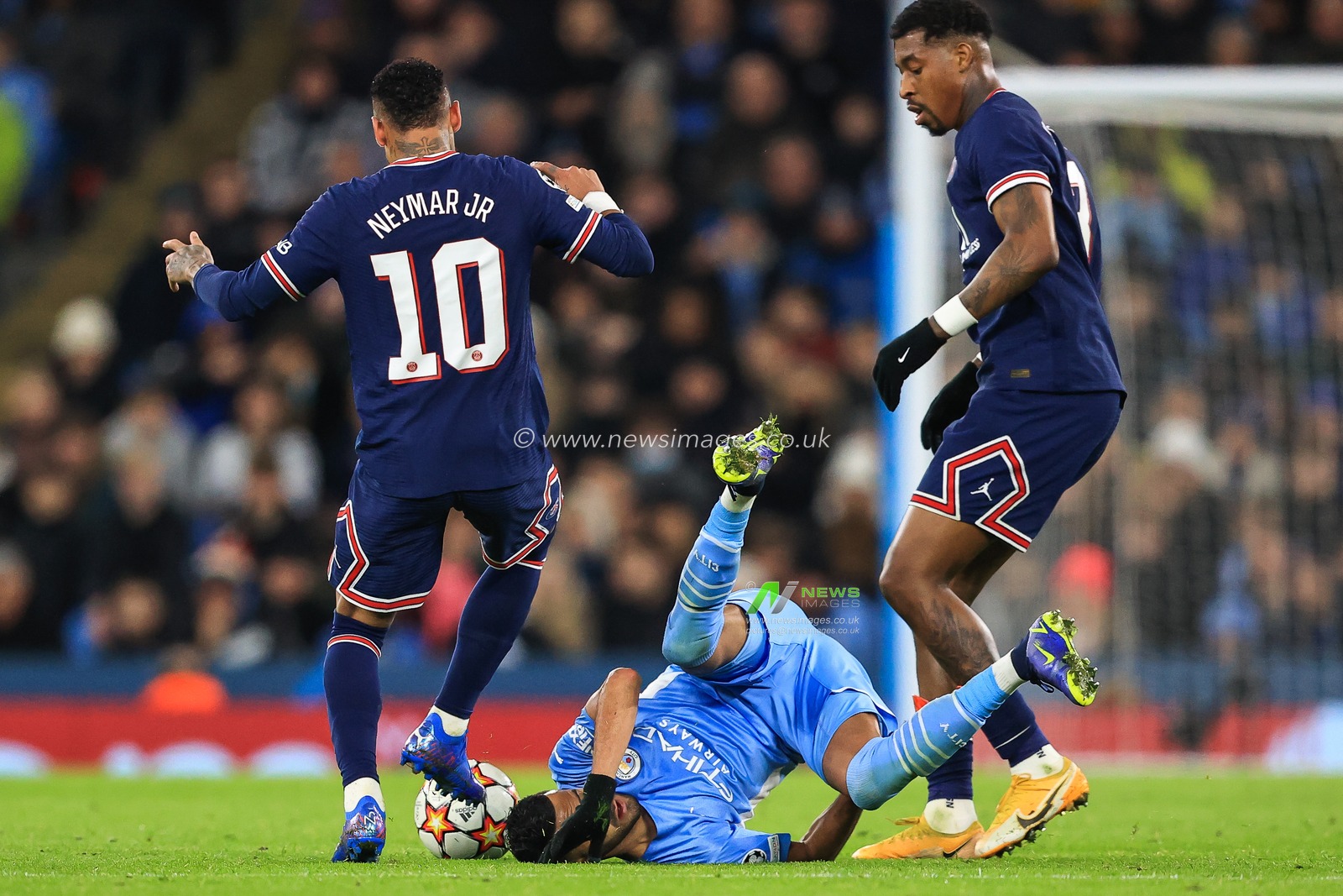 Riyad Mahrez #26 of Manchester City is fouled by Presnel Kimpembe #3 of Paris Saint-Germain