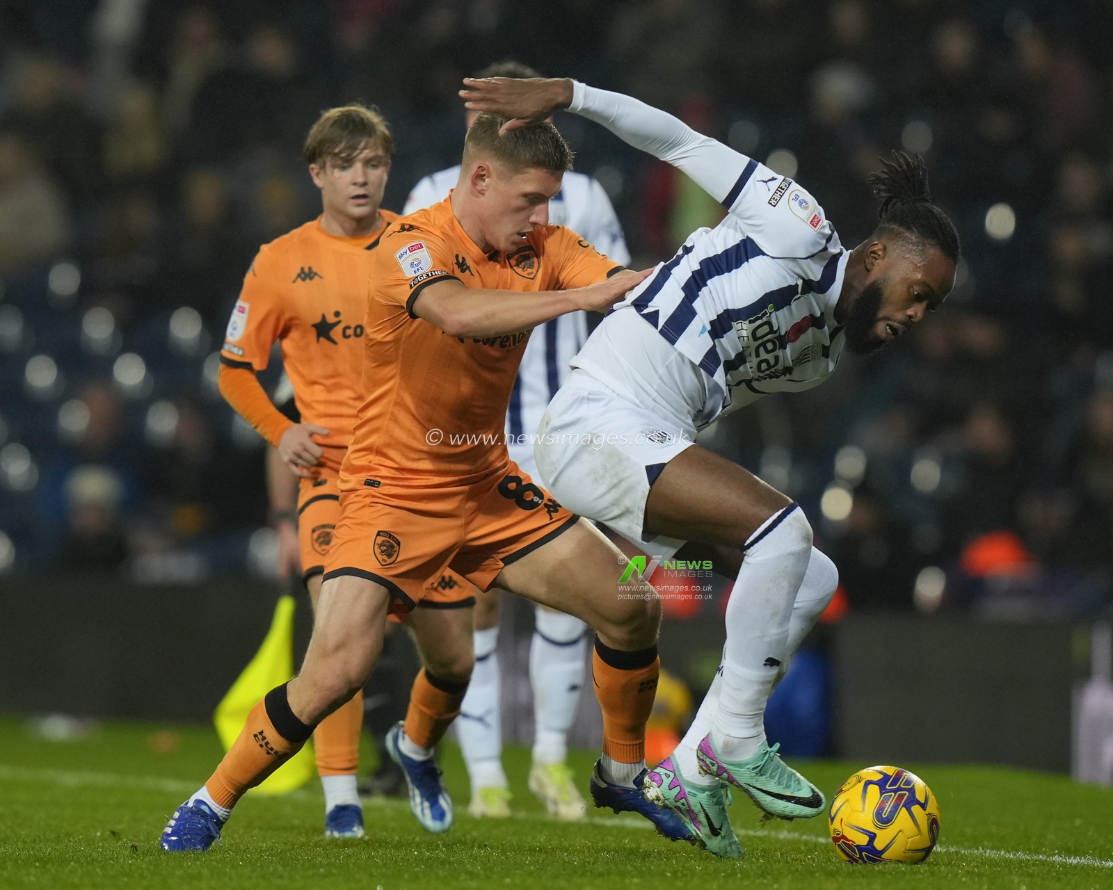 Greg Docherty #8 of Hull City competes for the ball with CÃ©dric KiprÃ© #4 of West Bromwich Albion during the Sky Bet Championship match West Bromwich Albion vs Hull City at The Hawthorns, West Bromwich, United Kingdom, 4th November 2023

(Photo by Steve Flynn/News Images)