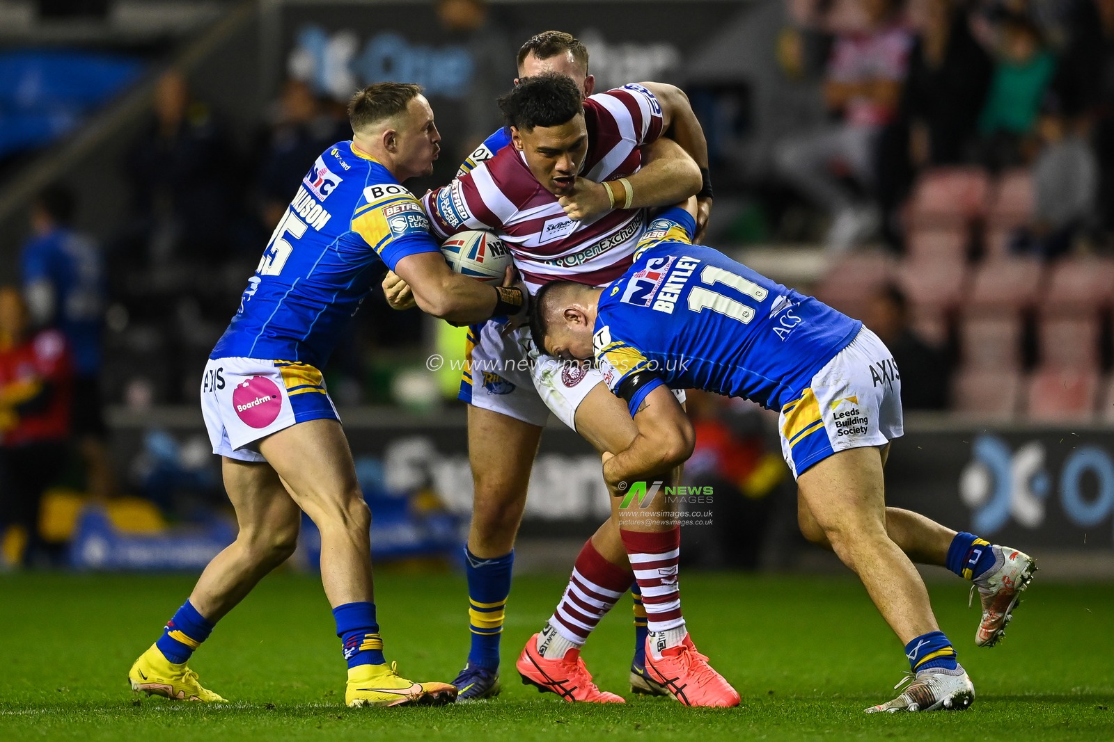 Patrick Mago #10 of Wigan Warriors is tackled by James Bentley #11 and James Donaldson #25 of Leeds Rhinos during the Betfred Super League match Wigan Warriors vs Leeds Rhinos at DW Stadium, Wigan, United Kingdom, 16th September 2022

(Photo by Craig Thomas/News Images)