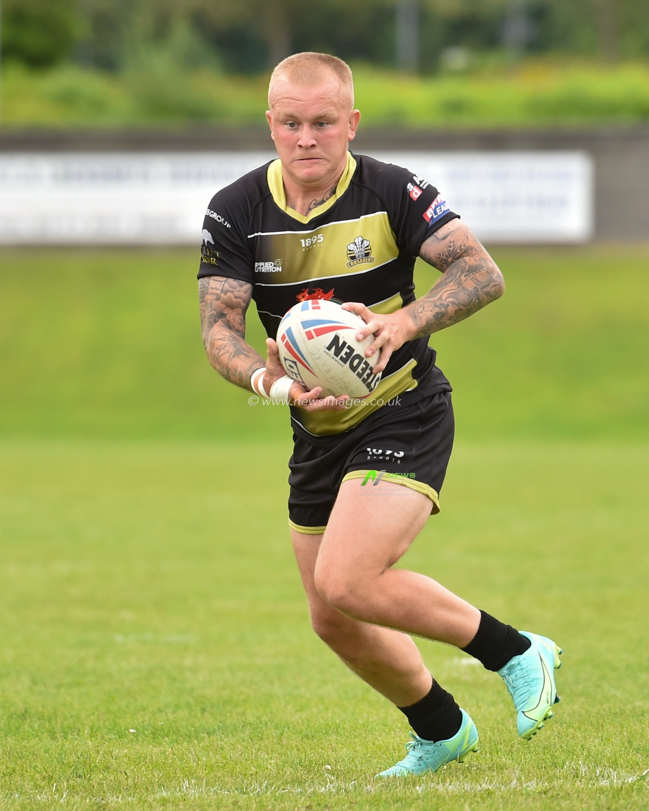 Brad Billsborough of North Wales Crusaders in action during the game