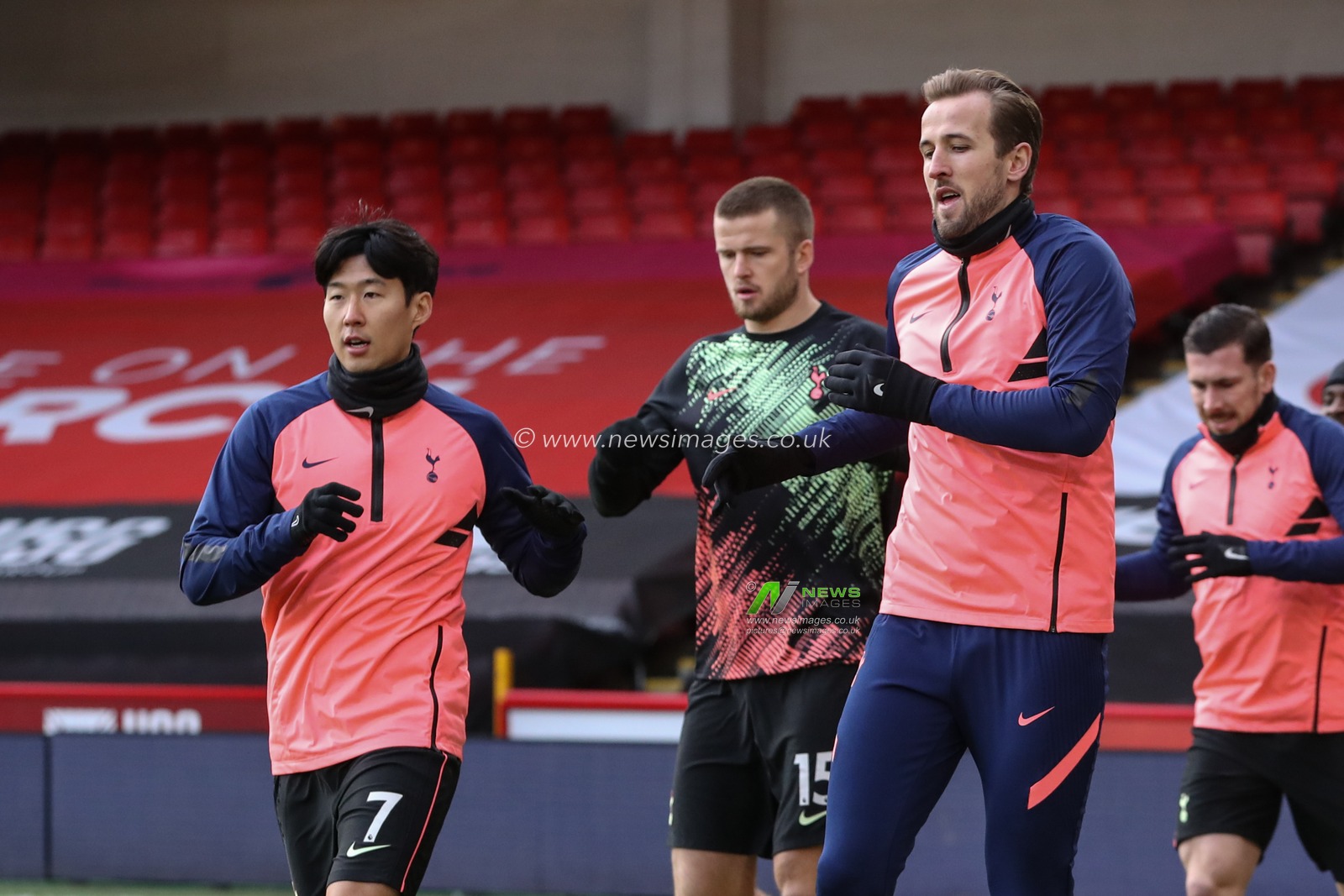 Harry Kane #10 of Tottenham Hotspur and Son Heung-Min #7 of Tottenham Hotspur warming up with team mates