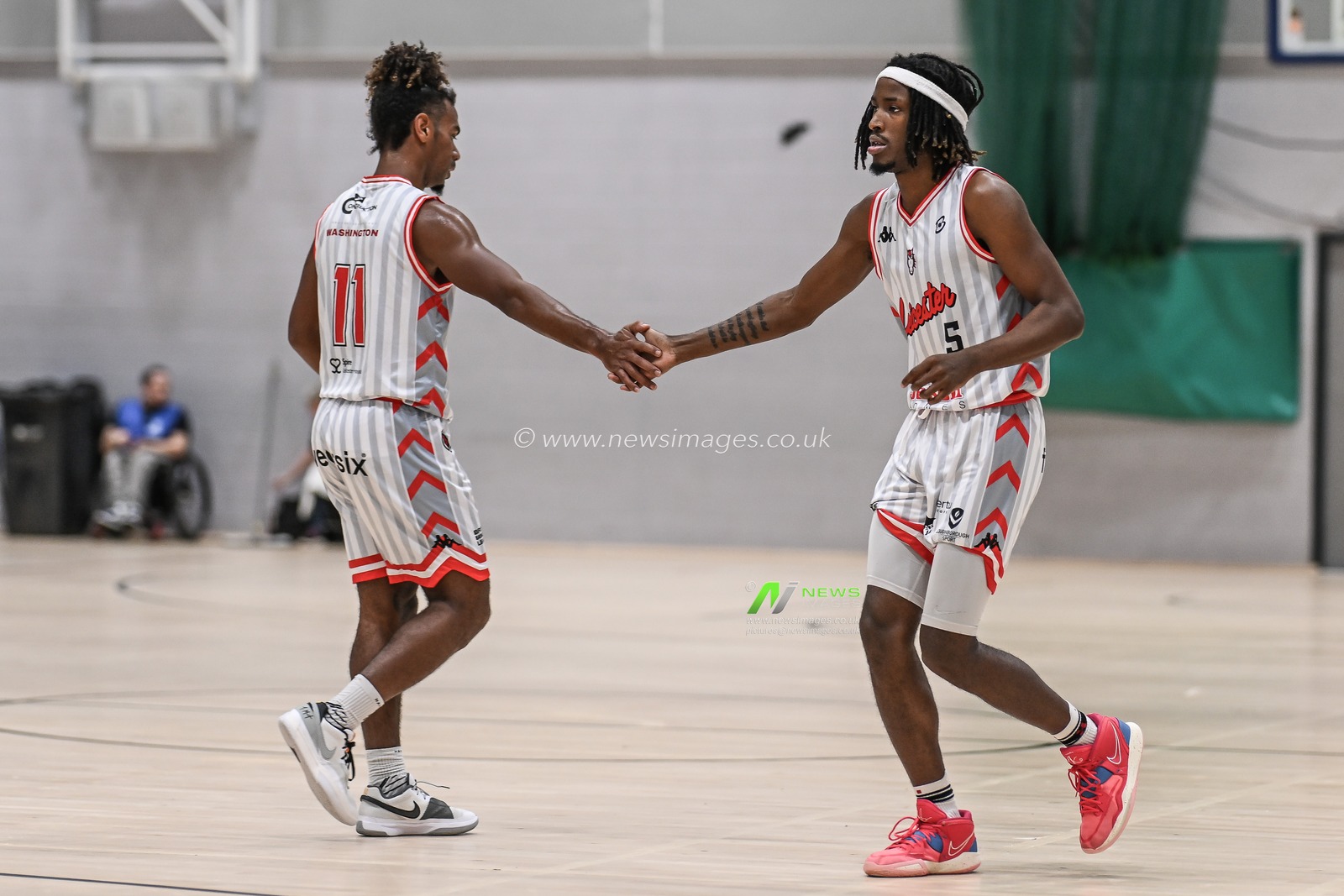Caleb Asberry of Leicester Riders hi fives Connor Washington of Leicester Riders during the British Basketball Championship match Cheshire Phoenix vs Leicester Riders at Ellesmere Port Sports Village, Ellesmere Port, United Kingdom, 12th November 2023

(Photo by Craig Thomas/News Images)