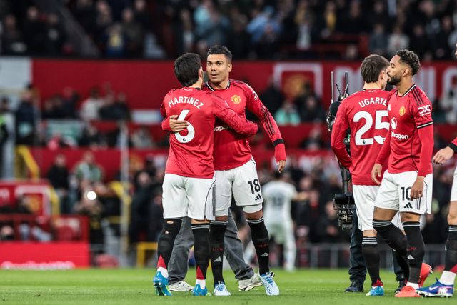Lisandro Martinez of Manchester United embraces Casemiro of Manchester United before the game during the Premier League match Manchester United vs Leeds United at Old Trafford, Manchester, United Kingdom on 13 April 2026

(Photo by Mark Cosgrove/News Images)