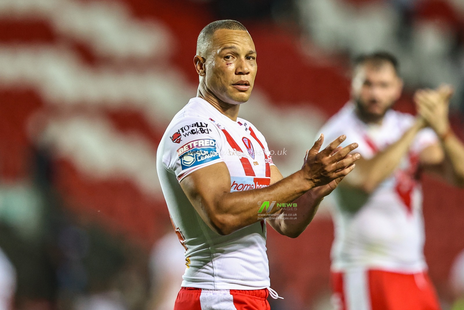 Moses Mbye of St. Helens applauds the fans after the game during the Betfred Super League round 19 match St Helens vs Leigh Leopards at Totally Wicked Stadium, St Helens, United Kingdom, 17th July 2025

(Photo by Alfie Cosgrove/News Images)