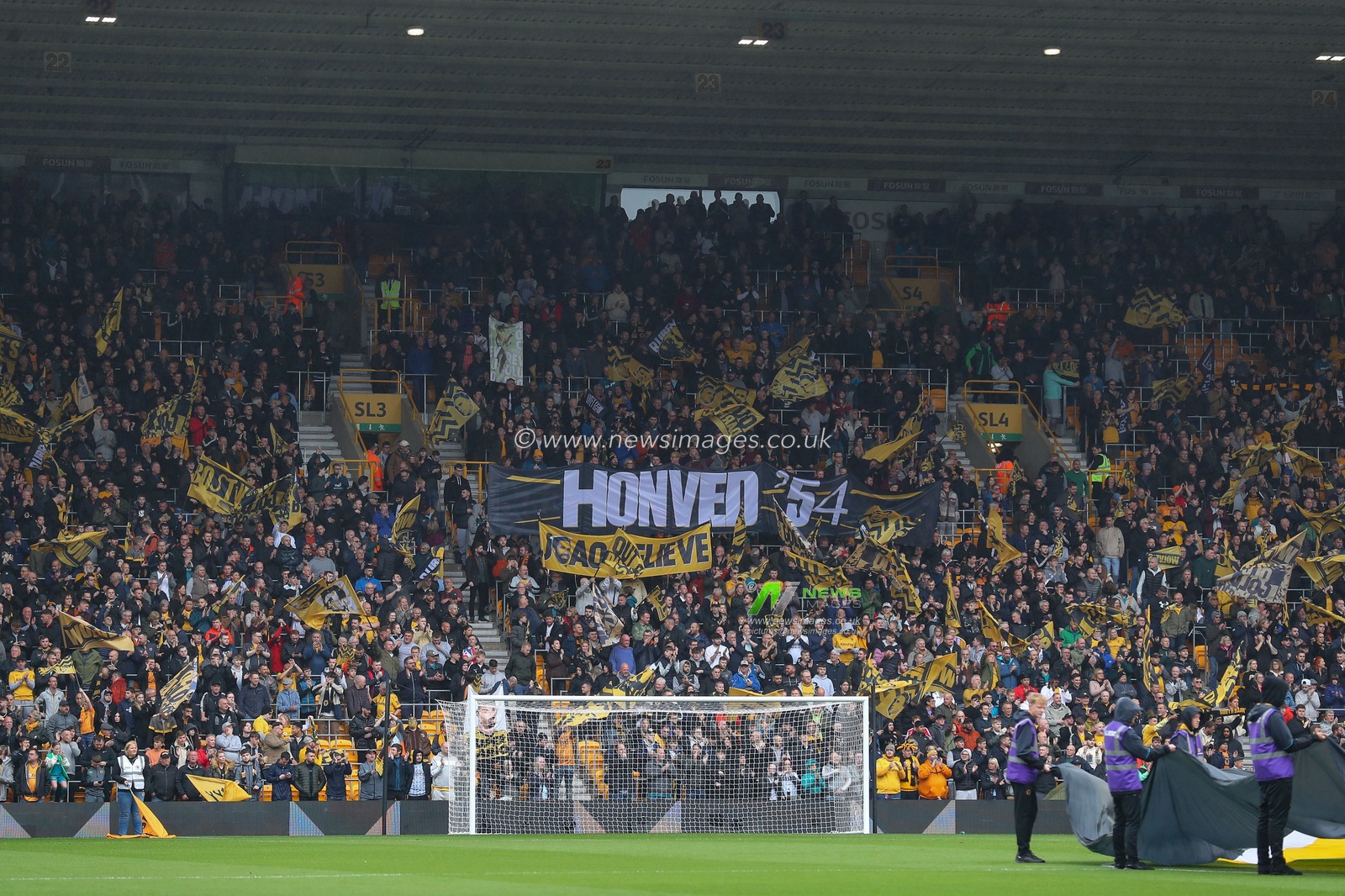 Wolverhampton Wanderers fans wave flags ahead of the Premier League match Wolverhampton Wanderers vs Aston Villa at Molineux, Wolverhampton, United Kingdom, 6th May 2023

(Photo by Gareth Evans/News Images)