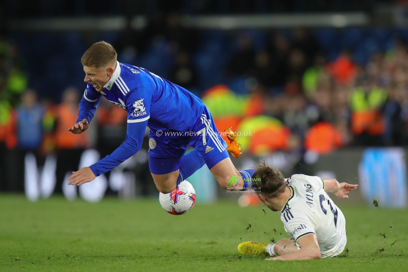 Luke Ayling #2 of Leeds United fouls Harvey Barnes #7 of Leicester City during the Premier League match Leeds United vs Leicester City at Elland Road, Leeds, United Kingdom, 25th April 2023

(Photo by James Heaton/News Images)