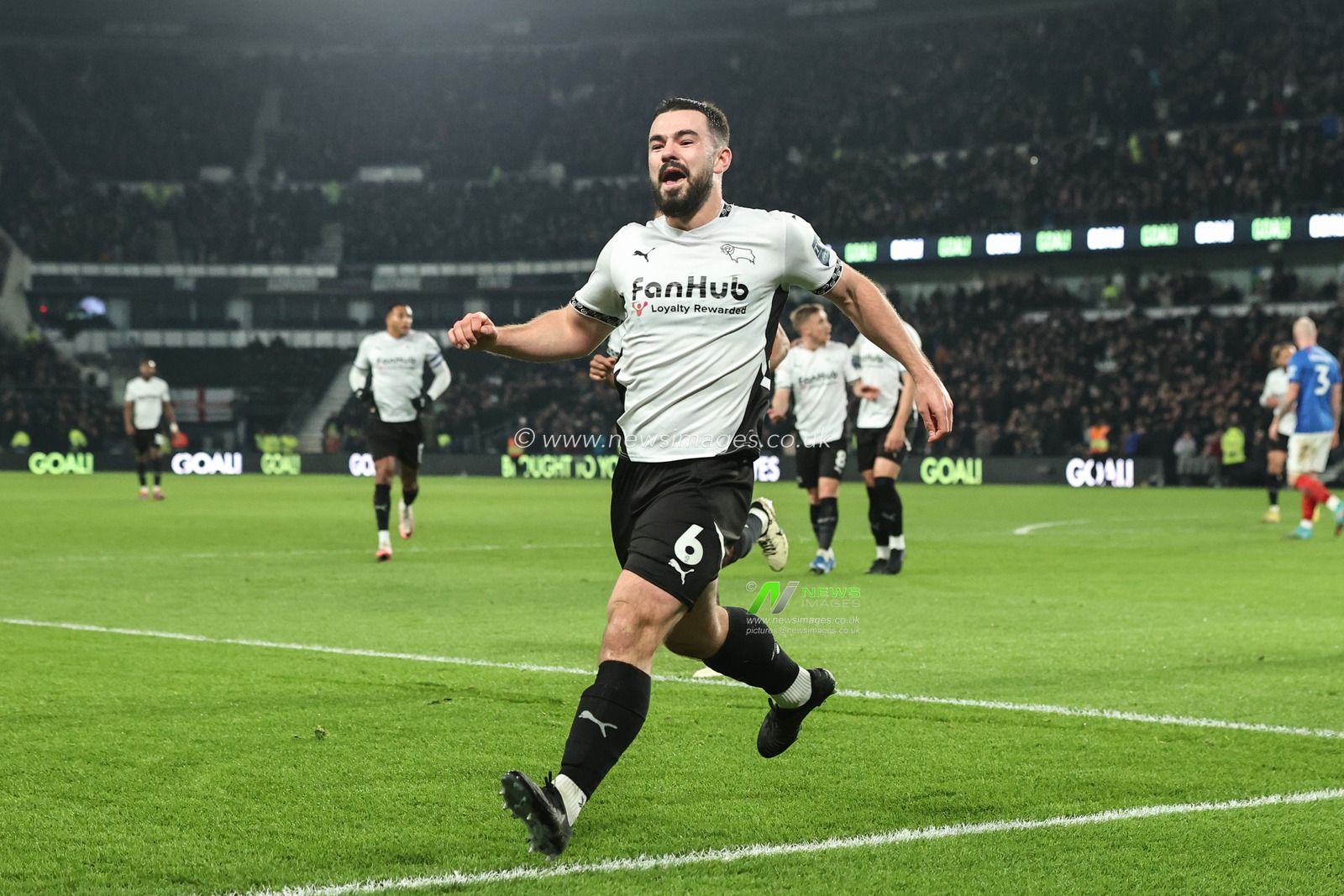 Eiran Cashin of Derby County celebrates his goal to make it 2-0 during the Sky Bet Championship match Derby County vs Portsmouth at Pride Park Stadium, Derby, United Kingdom, 13th December 2024

(Photo by Alfie Cosgrove/News Images)