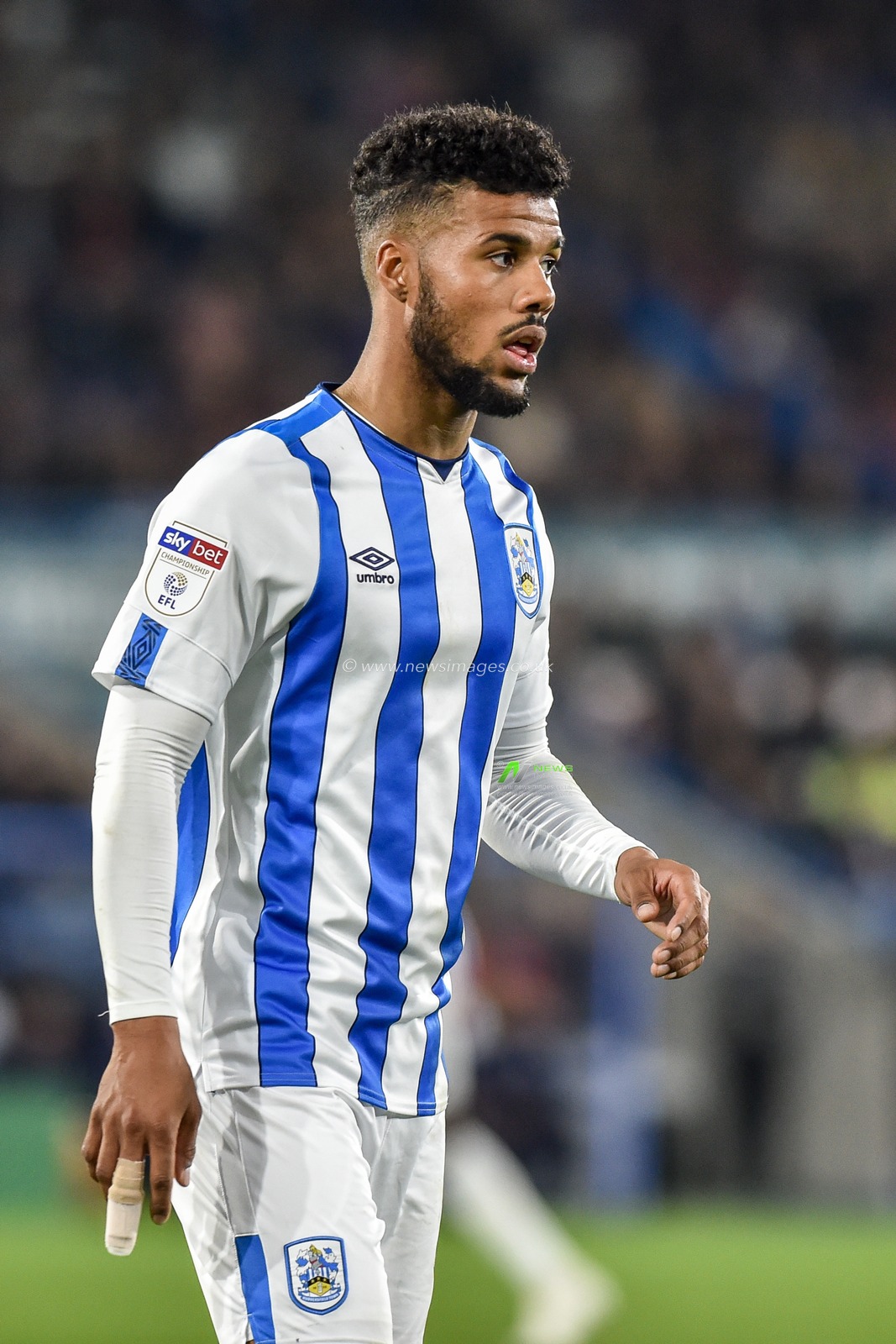 23rd October 2019, John Smith's Stadium, Huddersfield, England; Sky Bet Championship, Huddersfield Town v Middlesbrough : Elias Kachunga (9) of Huddersfield Town plays with an heavily strapped finger.

Credit: Dean Williams/News Images
