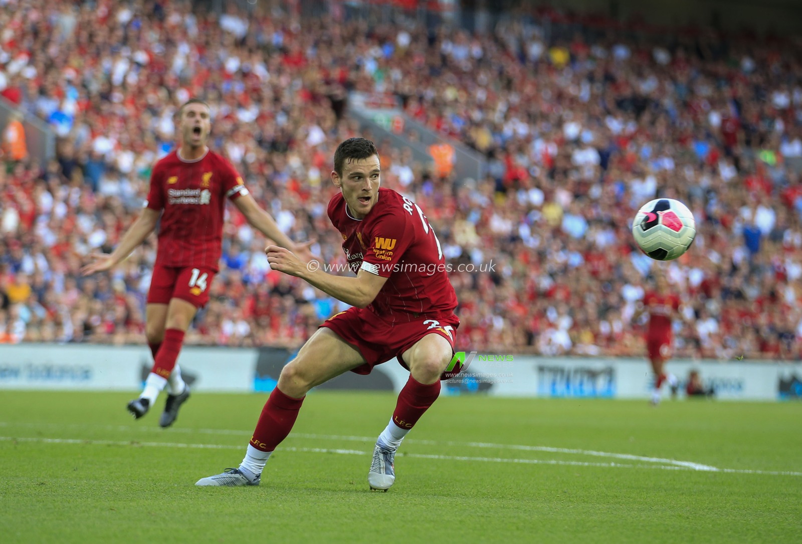 23rd August 2019 , Anfield, Liverpool, England; Premier League Football, Liverpool vs Arsenal ;   Andrew Robertson (26) of Liverpool runs for the loose ball

Credit: Conor Molloy/News Images 


Premier League/EFL Football images are subject to DataCo Licence