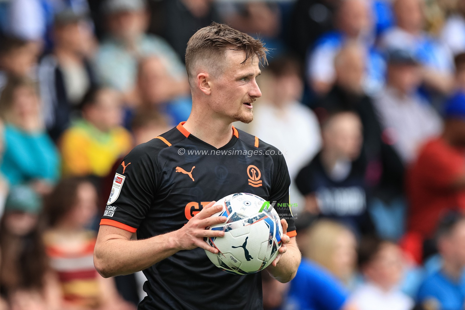 Callum Connolly #2 of Blackpool prepares to take a throw-in