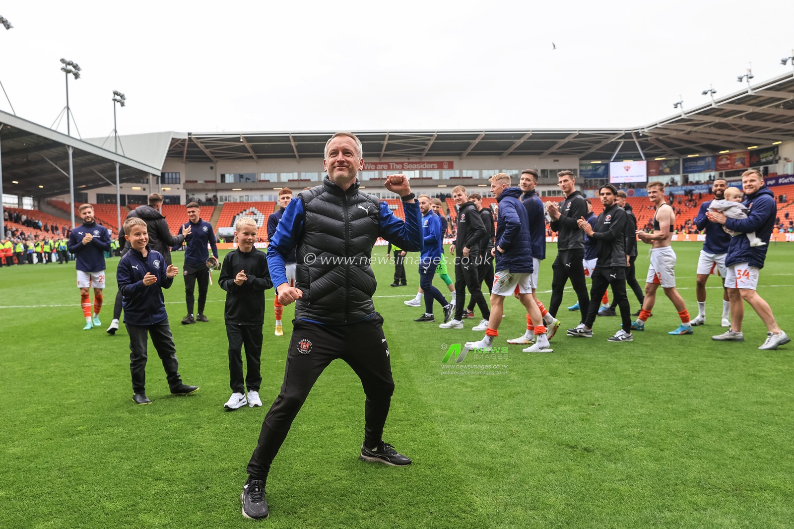 Neil Critchley head coach of Blackpool with the fans after the last home game of the season