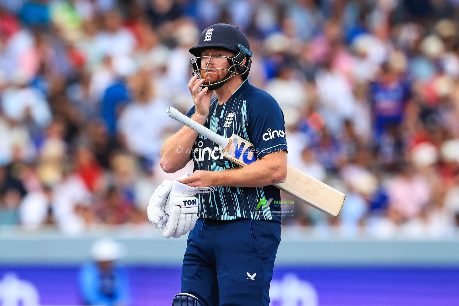 Jonny Bairstow of England leaves the field after he is bowled by Yuzvendra Chahal of India