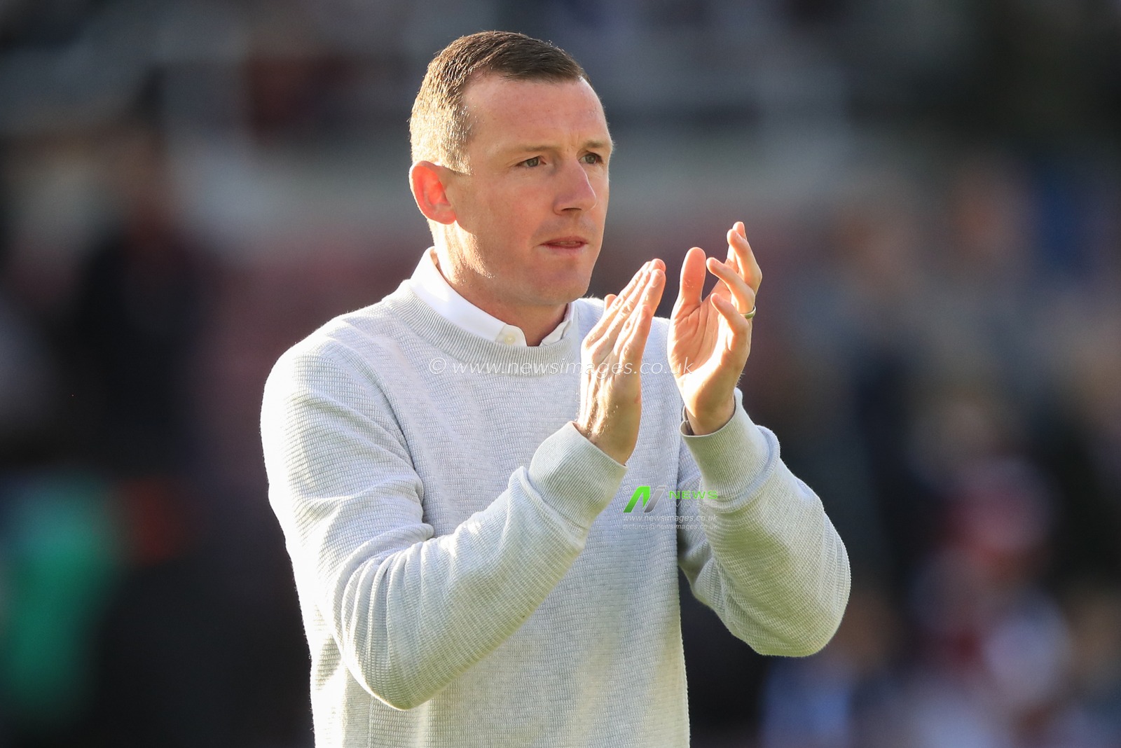 Neill Collins Head coach of Barnsley applauds the travelling fans as Barnsley win 1-2 during the Sky Bet League 1 match Northampton Town vs Barnsley at Sixfields Stadium, Northampton, United Kingdom, 23rd September 2023

(Photo by Alfie Cosgrove/News Images)