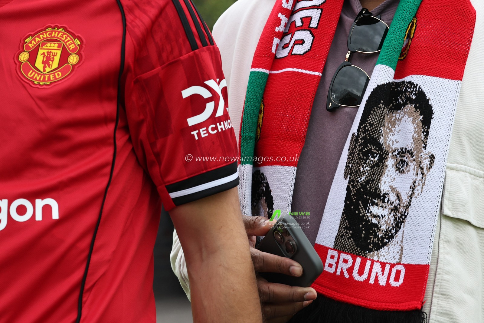 A fan with a Bruno Fernandes of Manchester United 
Scarf pin during the Premier League match Manchester United vs Burnley at Old Trafford, Manchester, United Kingdom, 30th August 2025

(Photo by Mark Cosgrove/News Images)