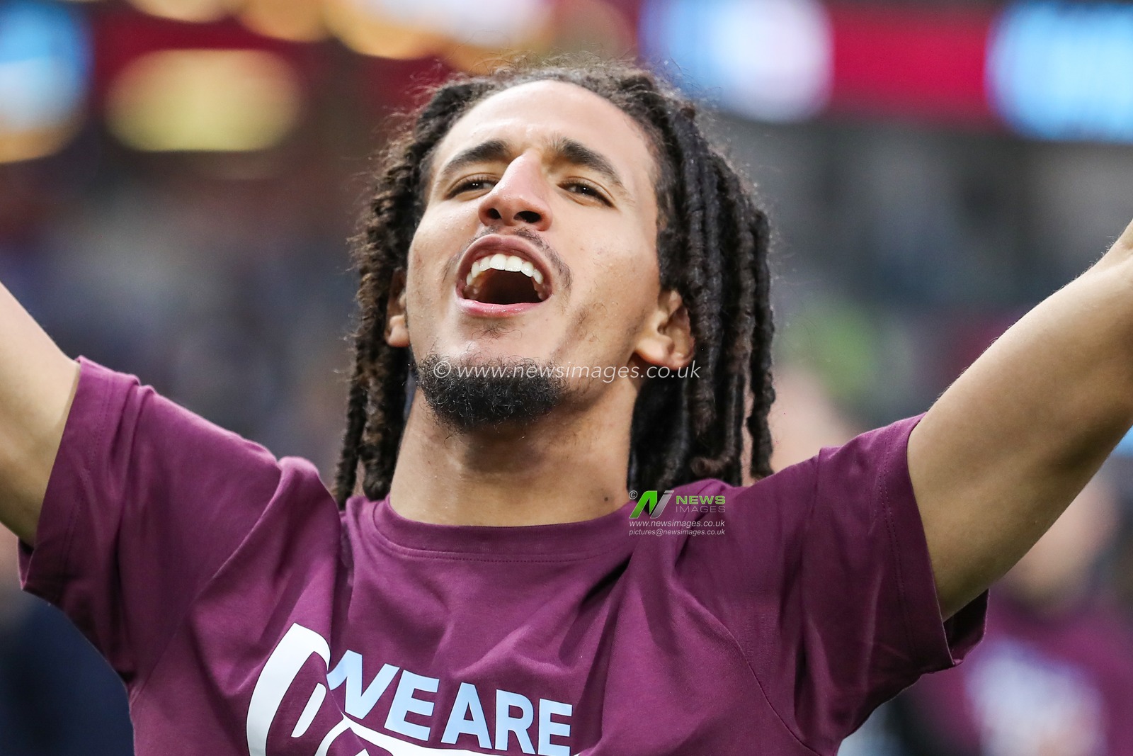 Hannibal Mejbri of Burnley celebrates getting promoted back to the premier league after the Sky Bet Championship match Burnley vs Sheffield United at Turf Moor, Burnley, United Kingdom, 21st April 2025

(Photo by Jorge Horsted/News Images)