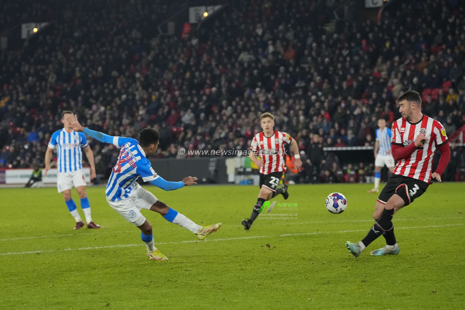 Kaine Kesler Hayden #16 of Huddersfield Town shoots at the Sheffield United goal during the Sky Bet Championship match Sheffield United vs Huddersfield Town at Bramall Lane, Sheffield, United Kingdom, 10th December 2022

(Photo by Steve Flynn/News Images)