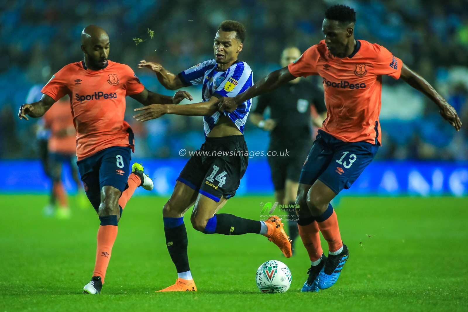 24th September 2019 , Hillsborough, Sheffield, England; EFL Carabao Cup Football, Third Round, Sheffield Wednesday vs Everton : Yerry Mina (13) and Fabian Delph (8) of Everton shepherd Jacob Murphy (14) of Sheffield Wednesday off the ball


Credit: Craig Milner/News Images,

English Football League images are subject to DataCo Licence