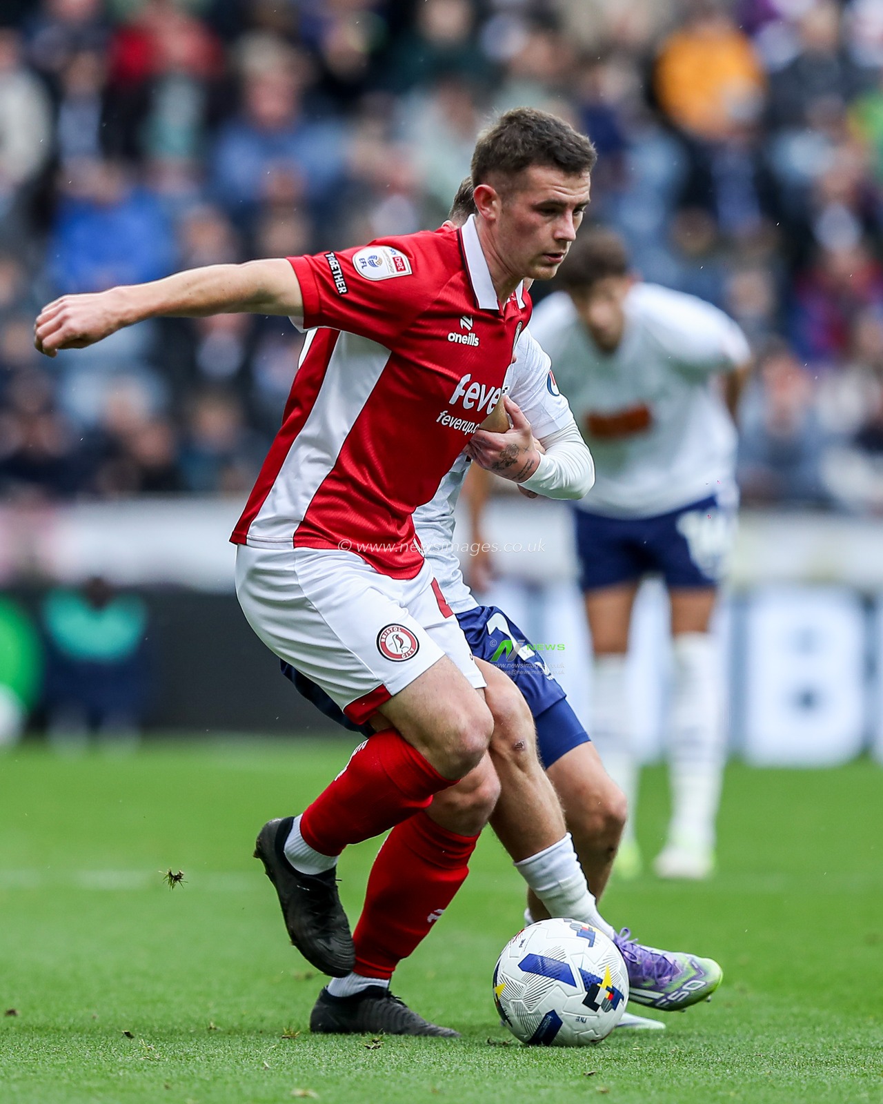 Alfie Devine of Preston North End tackles Rob Atkinson of Bristol City during the Sky Bet Championship match Preston North End vs Bristol City at Deepdale, Preston, United Kingdom, 27th September 2025

(Photo by Jorge Horsted/News Images)