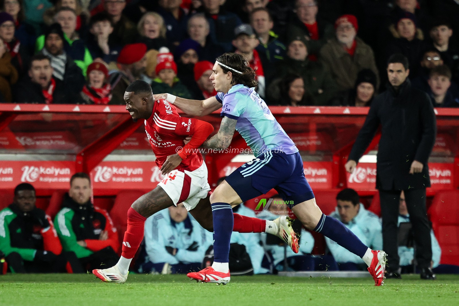 Callum Hudson-Odoi of Nottingham Forest is fouled by Riccardo Calafiori of Arsenal during the Premier League match Nottingham Forest vs Arsenal at City Ground, Nottingham, United Kingdom, 26th February 2025

(Photo by Alfie Cosgrove/News Images)