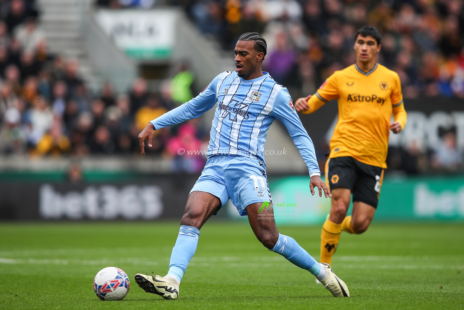 Haji Wright of Coventry City passes the ball during the Emirates FA Cup Quarter- Final match Wolverhampton Wanderers vs Coventry City at Molineux, Wolverhampton, United Kingdom, 16th March 2024

(Photo by Gareth Evans/News Images)