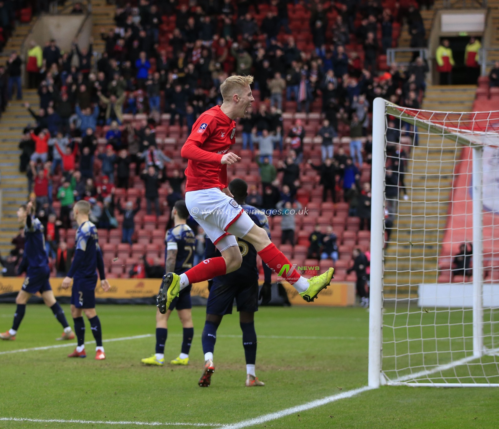 5th January 2020, Alexandra Stadium, Crewe, England; Emirates FA Cup, Crewe Alexandra v Barnsley : Charlie Kirk (10) of Crewe Alexandra celebrates  the equalising goal scored by Paul Green (12) of Crewe Alexandra making it 1-1

Credit: Conor Molloy/News Images