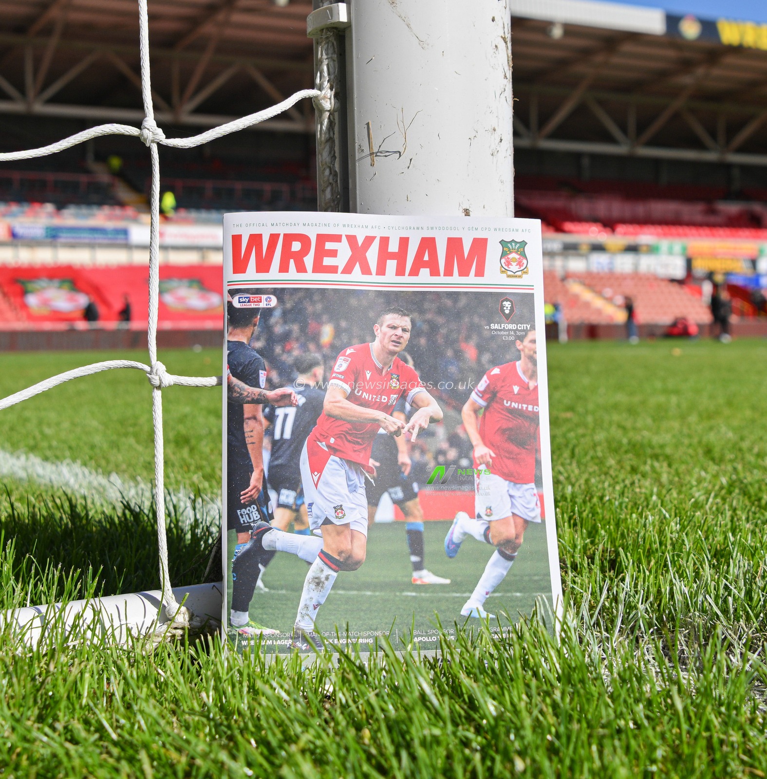Match program sits pitch side ahead of the match, during the Sky Bet League 2 match Wrexham vs Salford City at SToK Cae Ras, Wrexham, United Kingdom, 14th October 2023

(Photo by Cody Froggatt/News Images)