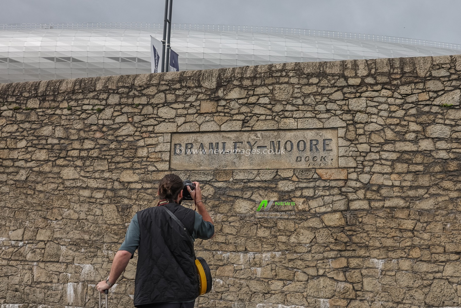 Press photographer takes a photo oaf the Bramley-Moore dock stone in the wall during the Pre-season friendly match Everton vs A.S. Roma at Hill Dickinson Stadium, Liverpool, United Kingdom, 9th August 2025

(Photo by Mark Cosgrove/News Images)