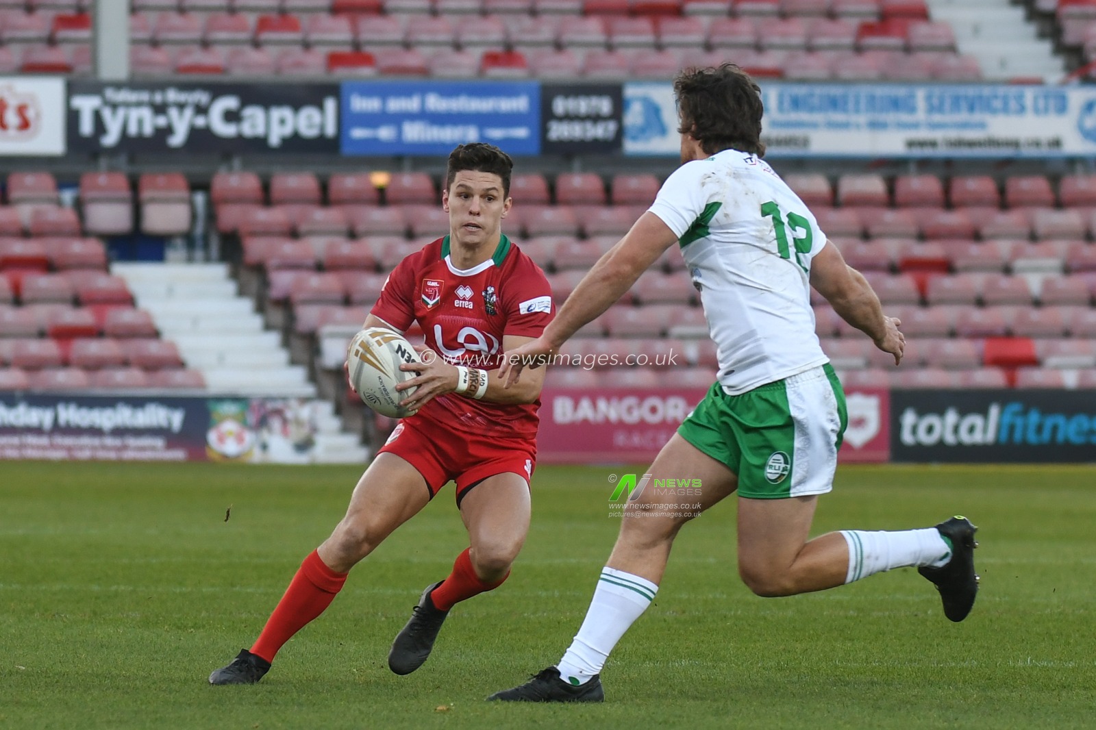 11th November 2018 , Racecourse Ground,  Wrexham, Wales ; Rugby League World Cup Qualifier, Wales v Ireland ; Josh Ralph of Wales (and Easts Tigers) on the attack


Credit:   Richard Long/News Images