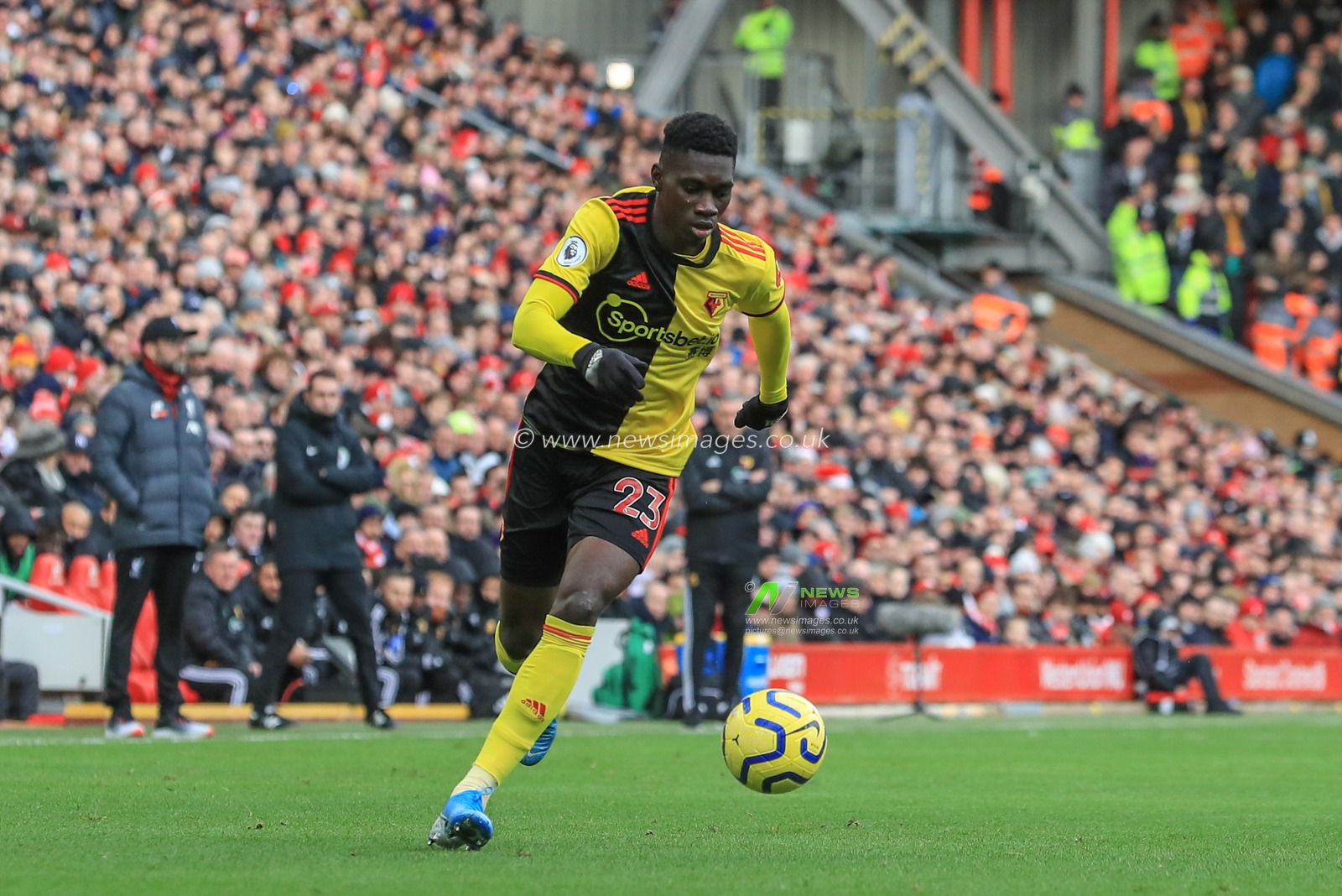 14th December 2019, Anfield, Liverpool, England; Premier League, Liverpool v Watford :  Ismaila Sarr (23) of Watford makes a break

Credit: Mark Cosgrove/News Images