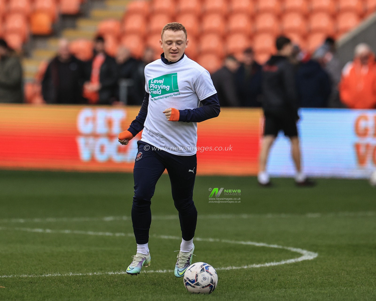 Shayne Lavery #19 of Blackpool during the pre-game warmup