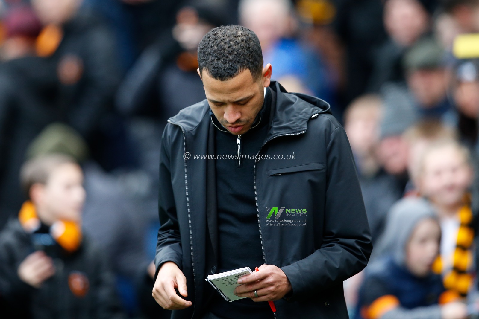 Liam Rosenior manager of Hull City looks at his notepad during the Sky Bet Championship match Hull City vs Millwall at MKM Stadium, Hull, United Kingdom, 10th April 2023

(Photo by Ben Early/News Images)