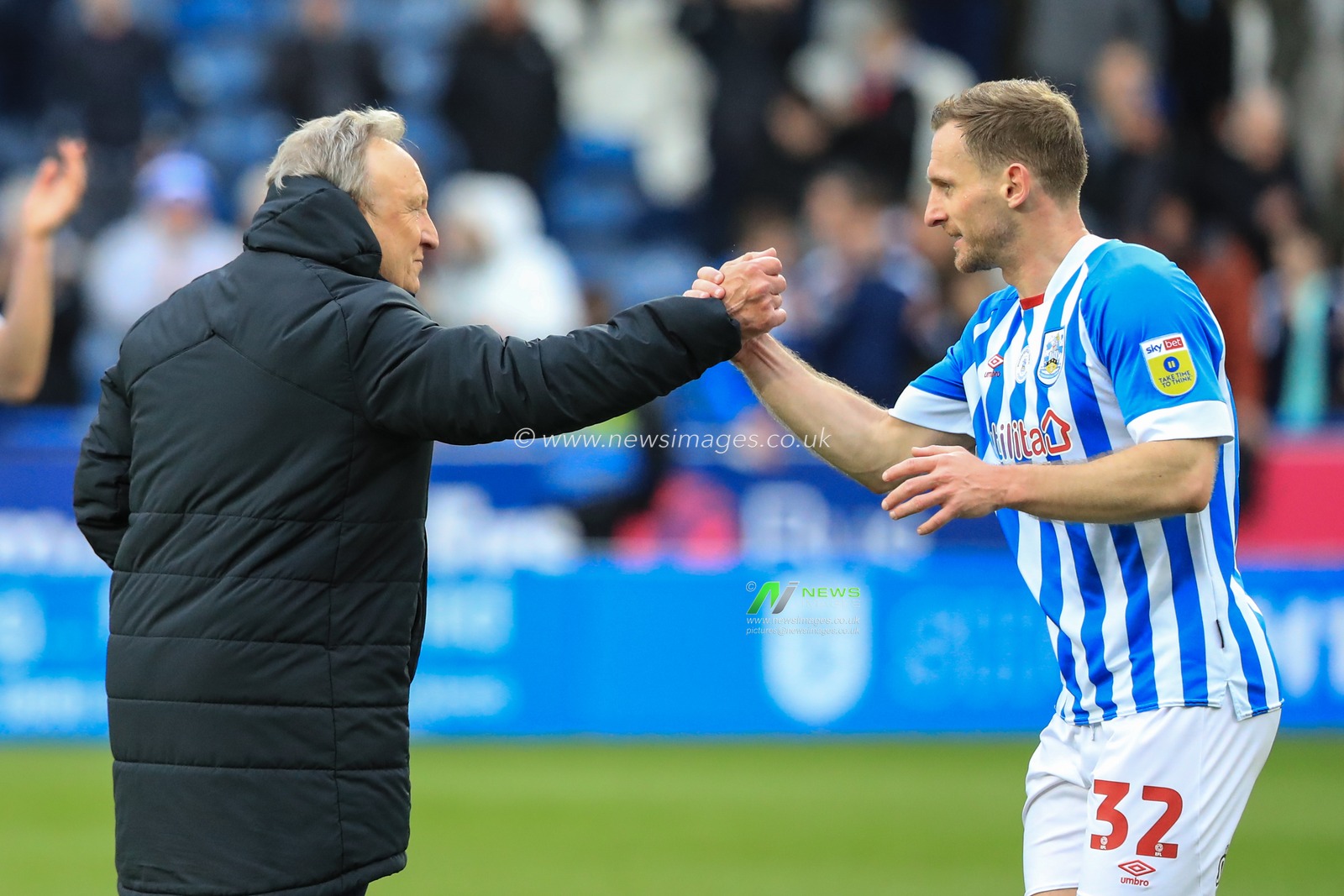 Neil Warnock manager of Huddersfield Town shakes hands with Tom Lees #32 of Huddersfield Town after the final whistle during the Sky Bet Championship match Huddersfield Town vs Middlesbrough at John Smith's Stadium, Huddersfield, United Kingdom, 1st April 2023

(Photo by Alfie Cosgrove/News Images)