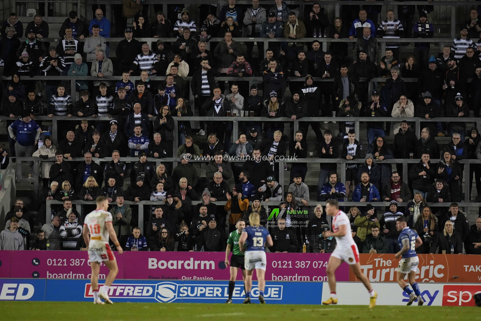 Hull FC fans watch their side defend during the Betfred Super League Round 5 match St Helens vs Hull FC at Totally Wicked Stadium, St Helens, United Kingdom, 17th March 2023

(Photo by Steve Flynn/News Images)