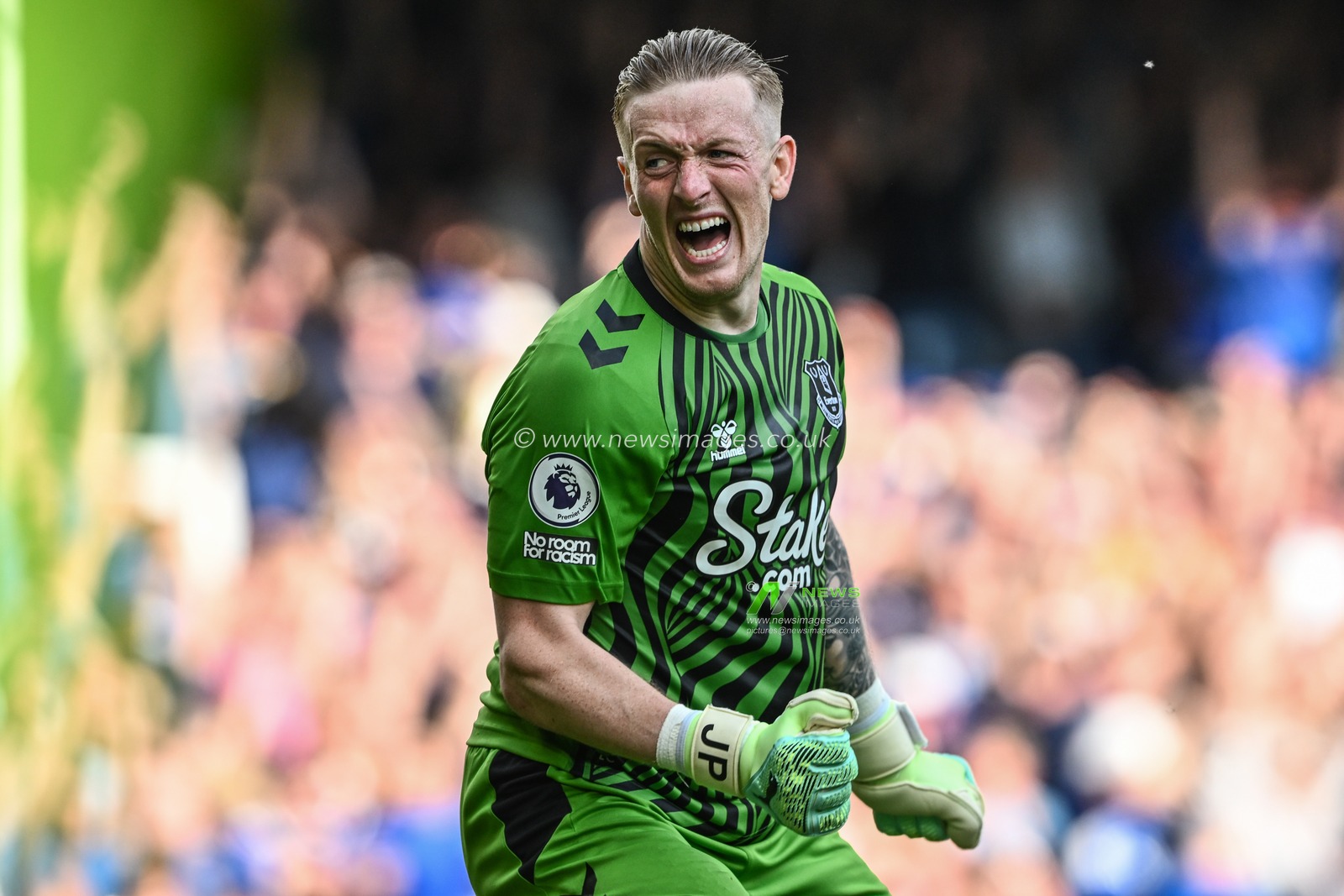 Jordan Pickford #1 of Everton celebrates Everton avoiding relegation after the final whistle during the Premier League match Everton vs Bournemouth at Goodison Park, Liverpool, United Kingdom, 28th May 2023

(Photo by Craig Thomas/News Images)