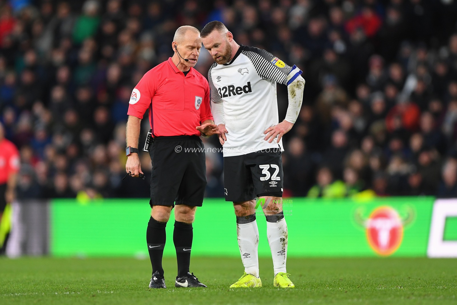 18th January 2020, Pride Park Stadium, Derby, England; Sky Bet Championship, Derby County v Hull City : Referee Andy Woolmer has words with Derby County Player-Coach Wayne Rooney 

Credit: Jon Hobley/News Images