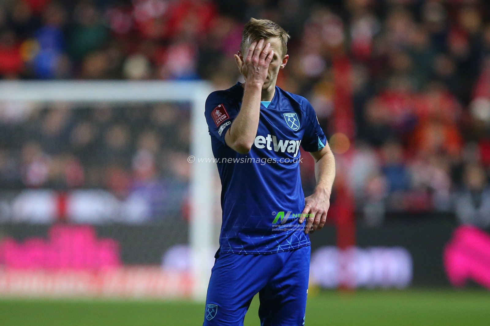 James Ward-Prowse of West Ham United looks dejected during the Emirates FA Cup Third Round Replay match Bristol City vs West Ham United at Ashton Gate, Bristol, United Kingdom, 16th January 2024

(Photo by Gareth Evans/News Images)