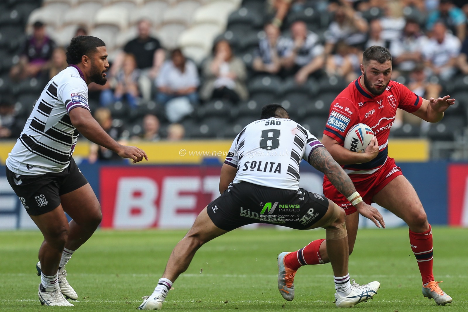 Matty Storton #13 of Hull KR runs at Ligi Sao #8 of Hull FC during the Betfred Super League match Hull FC vs Hull KR at MKM Stadium, Hull, United Kingdom, 3rd September 2022

(Photo by David Greaves Photos/ Via/News Images)