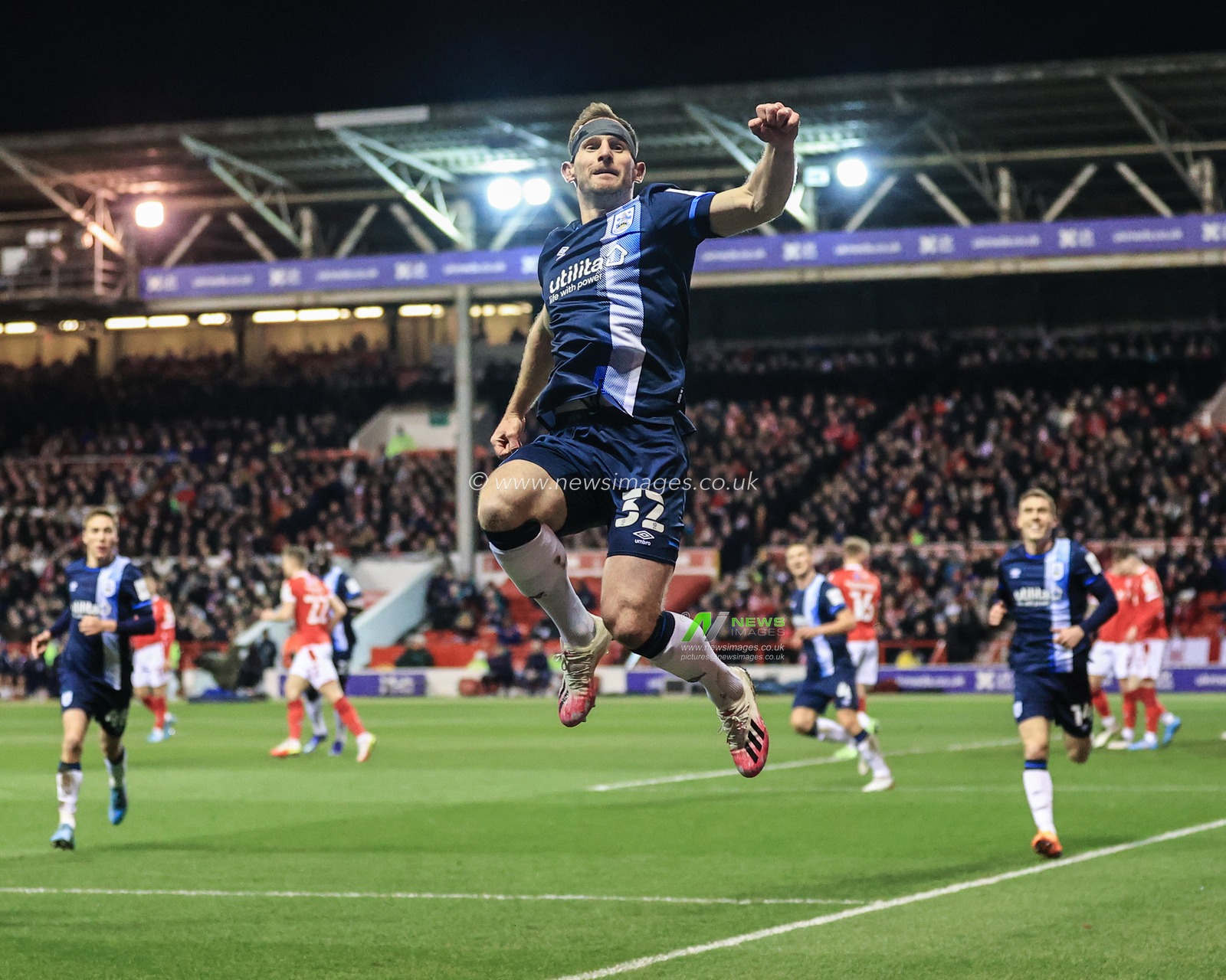Tom Lees #32 of Huddersfield Town celebrates his goal to make it 0-1