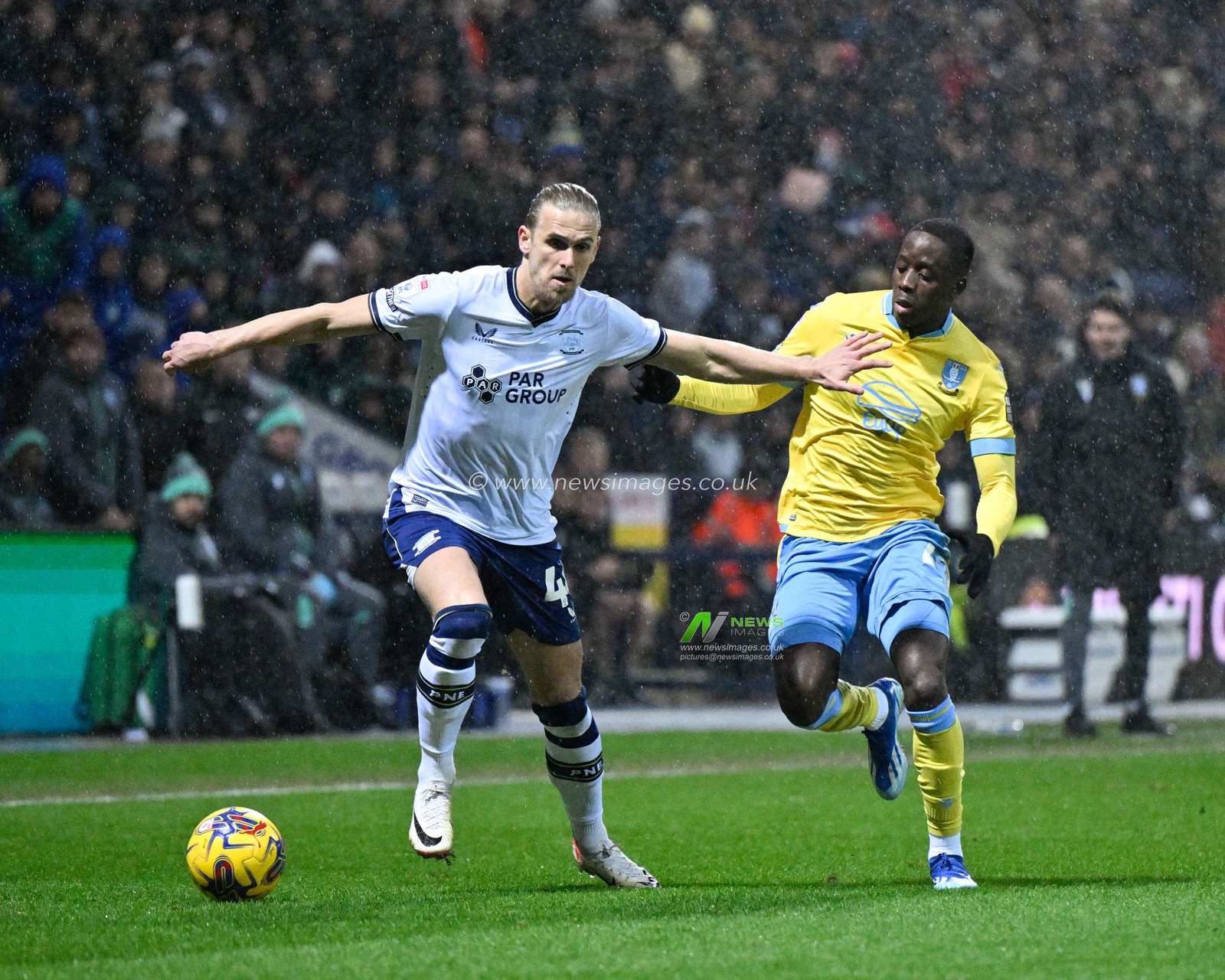 Brad Potts 44# of Preston North End and Djeidi Gassama #41 of Sheffield Wednesday battle for the ball, during the Sky Bet Championship match Preston North End vs Sheffield Wednesday at Deepdale, Preston, United Kingdom, 29th December 2023

(Photo by Cody Froggatt/News Images)