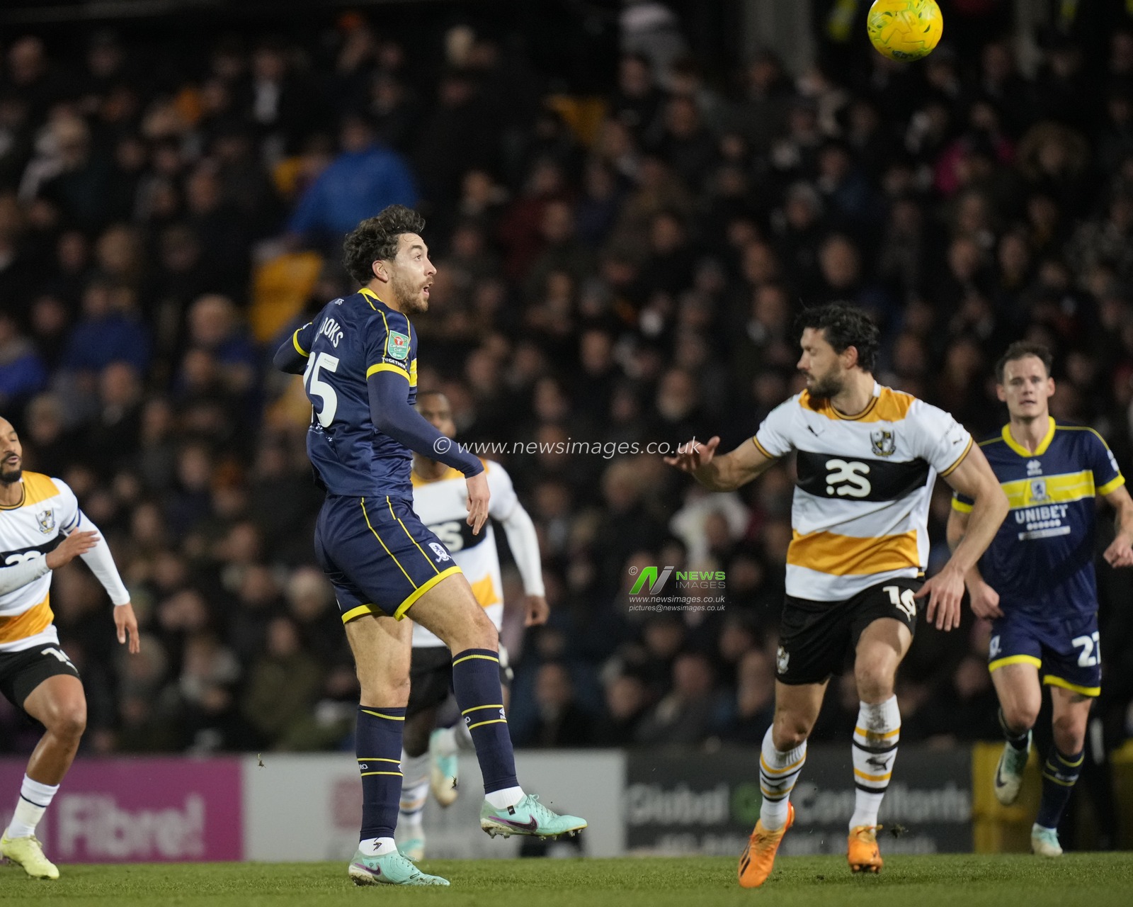 Matt Crooks #25 of Middlesbrough heads goal wards during the Carabao Cup Quarter Final match Port Vale vs Middlesbrough at Vale Park, Burslem, United Kingdom, 19th December 2023

(Photo by Steve Flynn/News Images)